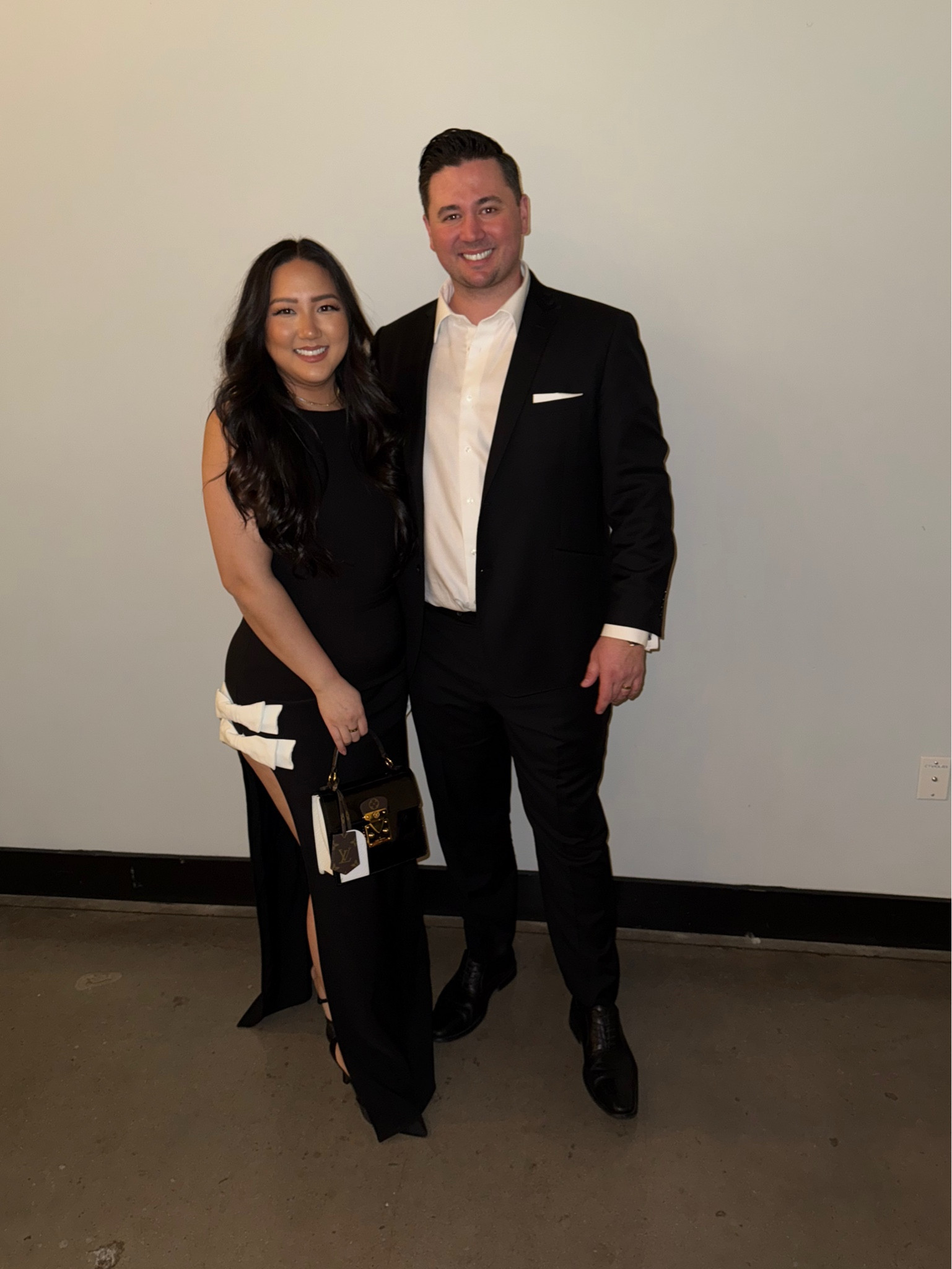 The CUTEST little black dress! Love the bow detail and sexy high slits. Such a pretty formal dress for fun functions/events!! 

#LTKMidsize #LTKFindsUnder100 #LTKWedding