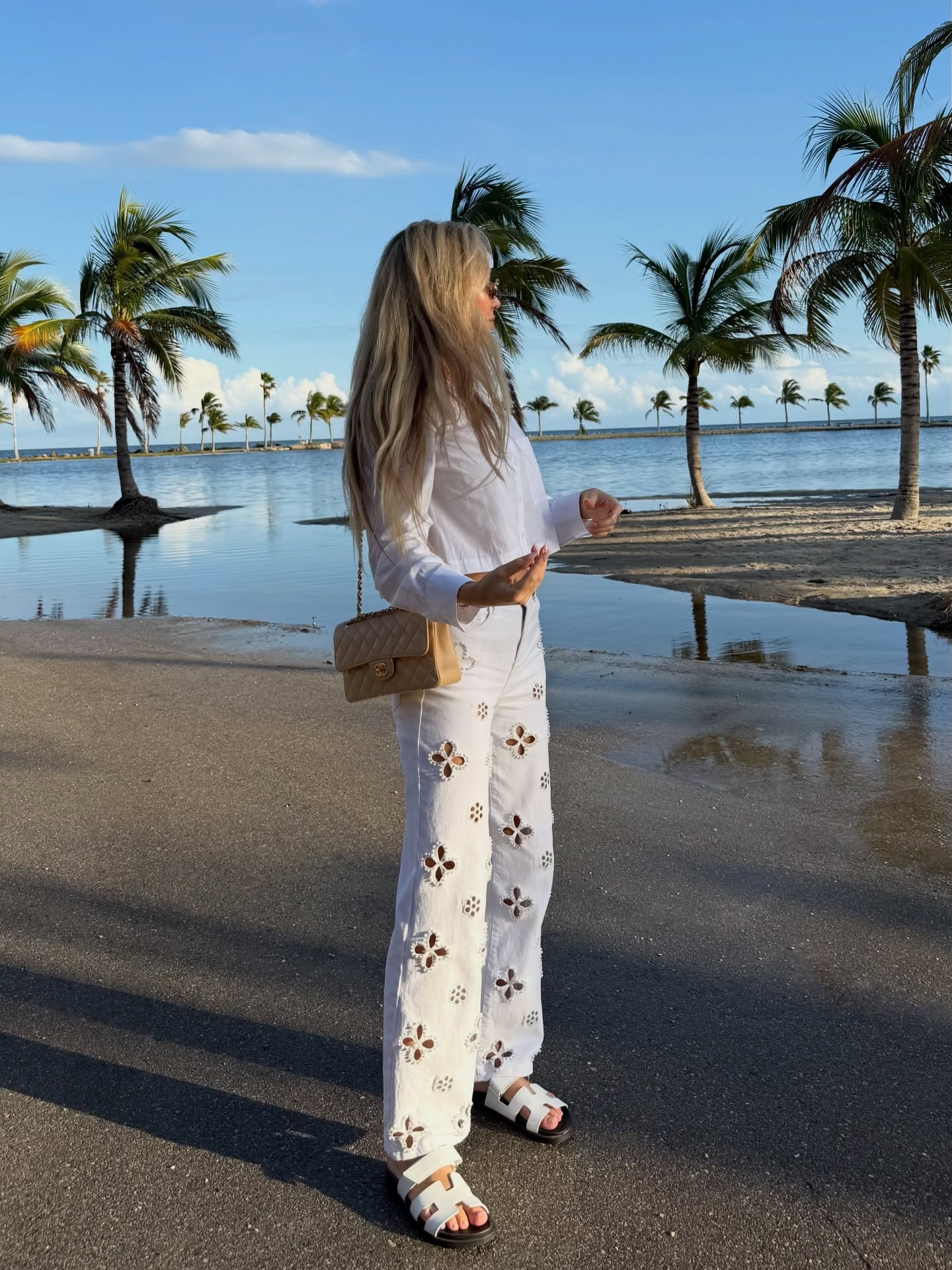 Florida filter, no edits, just palm trees, frizzy hair yet perfect weather for stylish all white early spring looks 🤍🌴 My favorite fashion chic white denim pants - wearing a size S - they are stretchy however I wouldn’t hesitate to size up if you are in between sizes ☝️ #chanelflapbag #beigechanel #hermeschypre

#LTKootd #LTKFindsUnder100