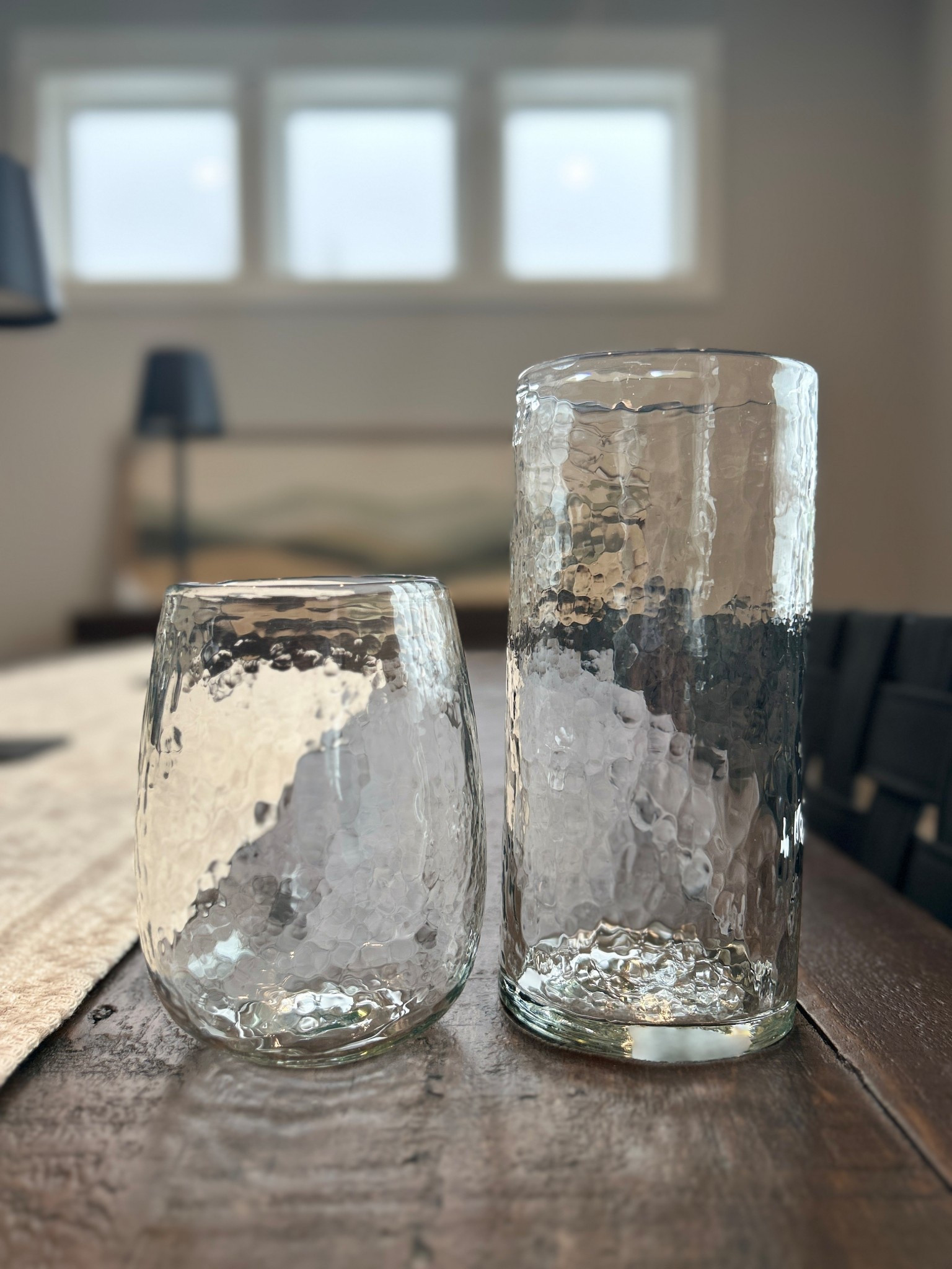 Stemless wine glass and drinking glasses side by side, from the hammered drinkware collection at potterybarn.

#LTKHome