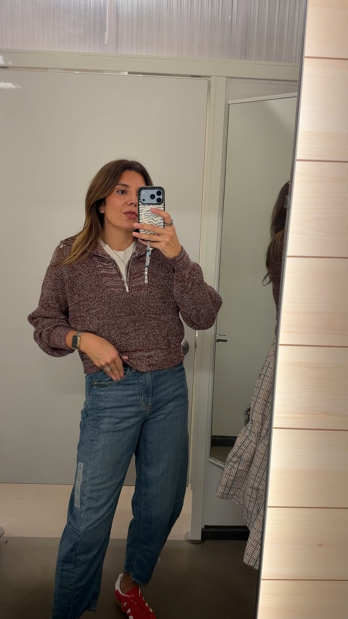 Quarter zip in a size small, barrel jeans in a 4. I’m 5’7”.