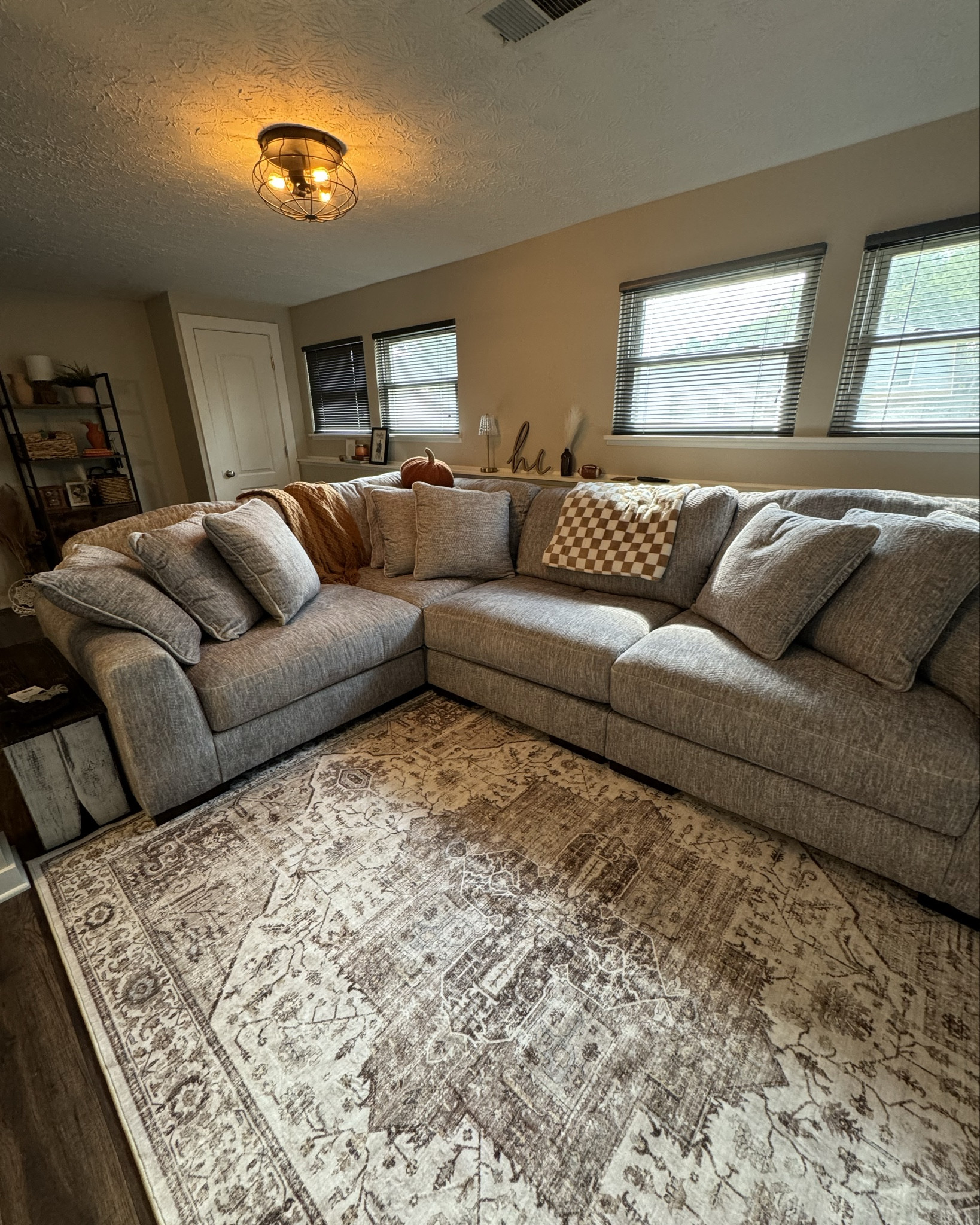 Cozy living room 
Couch 
Pumpkin pillow 
Blanket 
Rug- white / brown 6x9 


#LTKFindsUnder50 #LTKStyleTip #LTKHome