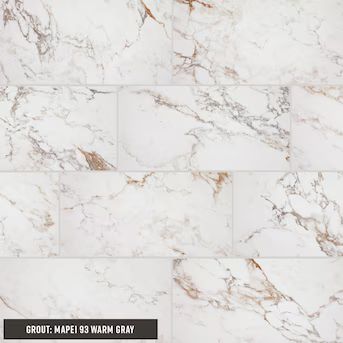 STAINMASTER Calacatta Gem 12-in x 24-in Matte Porcelain Marble Look Floor and Wall Tile (1.95-sq.... | Lowe's