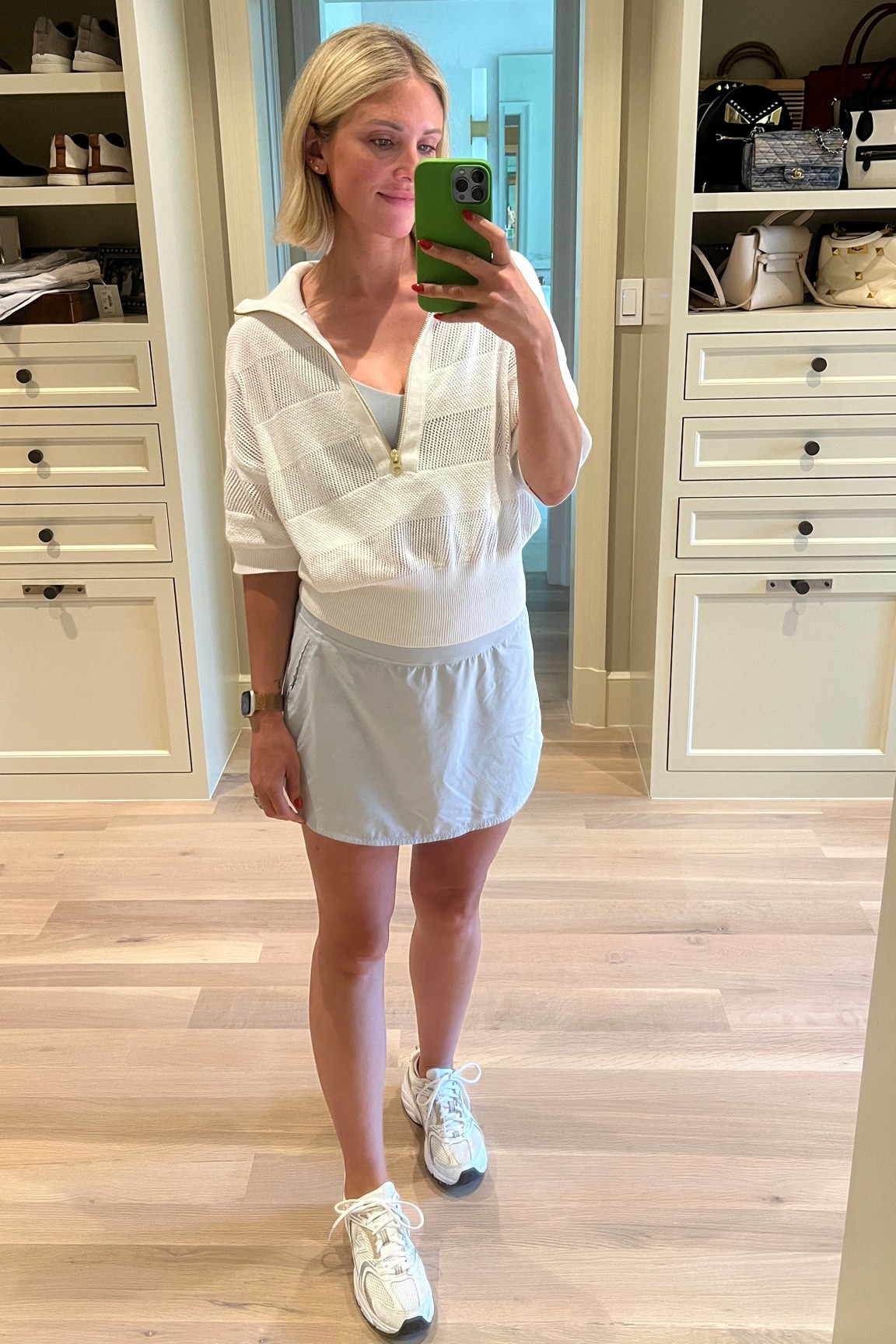 Varley open knit half sleeve half zip sweater / outdoor voices tennis skirt / new balance sneakers 

#LTKActive