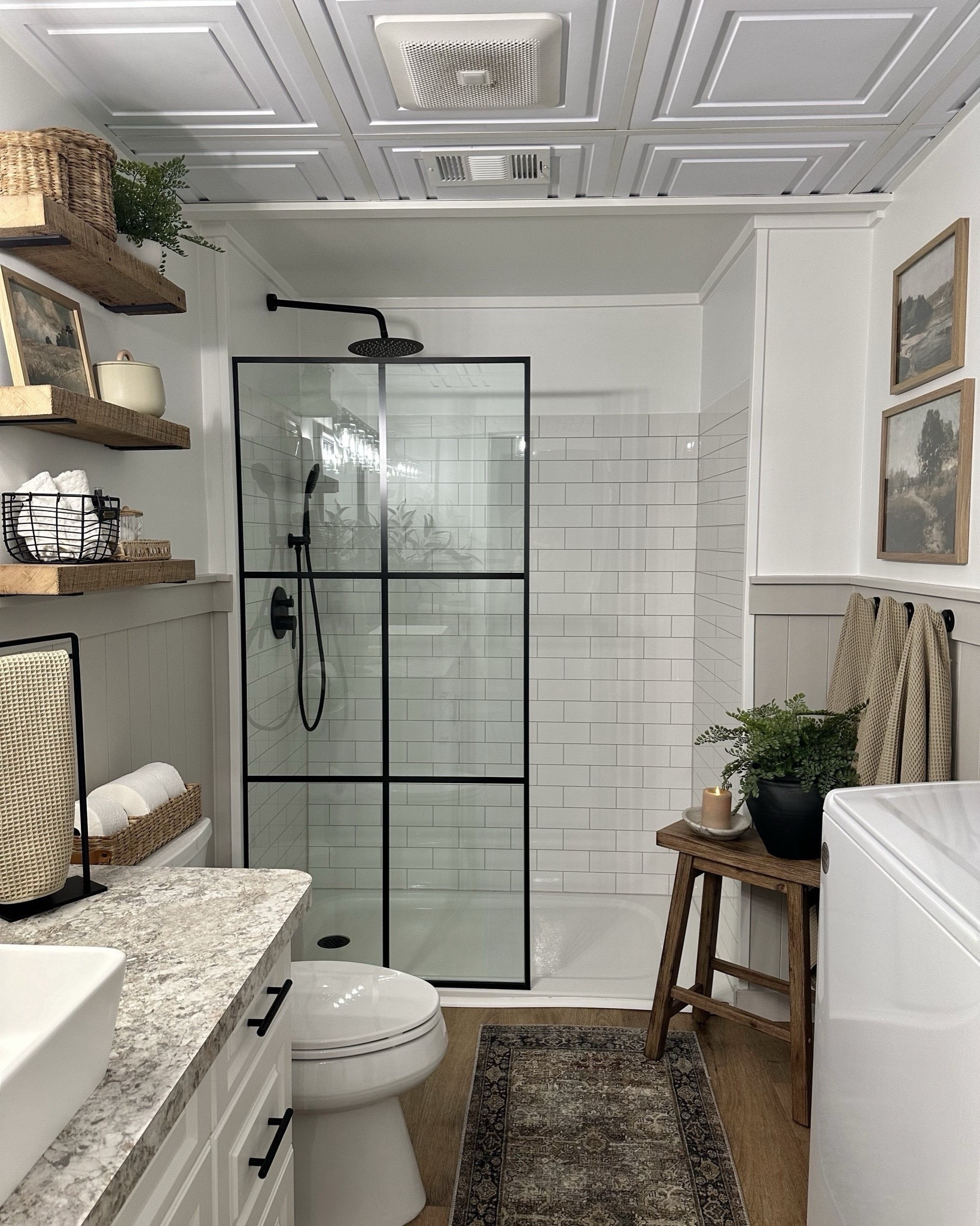 Bathroom Views.  Follow @farmtotablecreations on Instagram for more inspiration.

It’s been two years since we completed this bathroom/laundry room reno and it’s still one of my favorites to date. 

For reference:
Top Frame 11x14
Bottom Frame 14x18
Wall color: Agreeable Gray/Bright White by Sherwin Williams. 
Loloi Rug: Olive Charcoal

Target | Studio McGee | Amazon | Amazon Home Finds | Loloi Rugs | Bathroom Decor | Bathroom Storage | Amazon Must Haves | Bathroom Shelves | Home Decorating | Decor Ideas | Budget Friendly Decor | Home Inspiration | Amazon Sale | open shelves | Small Spaces | Bathroom Shelves | Small Bathroom Storage | Fall Decor | Fall Bathroom Decor | Fall Refresh

#LTKHome #LTKSaleAlert