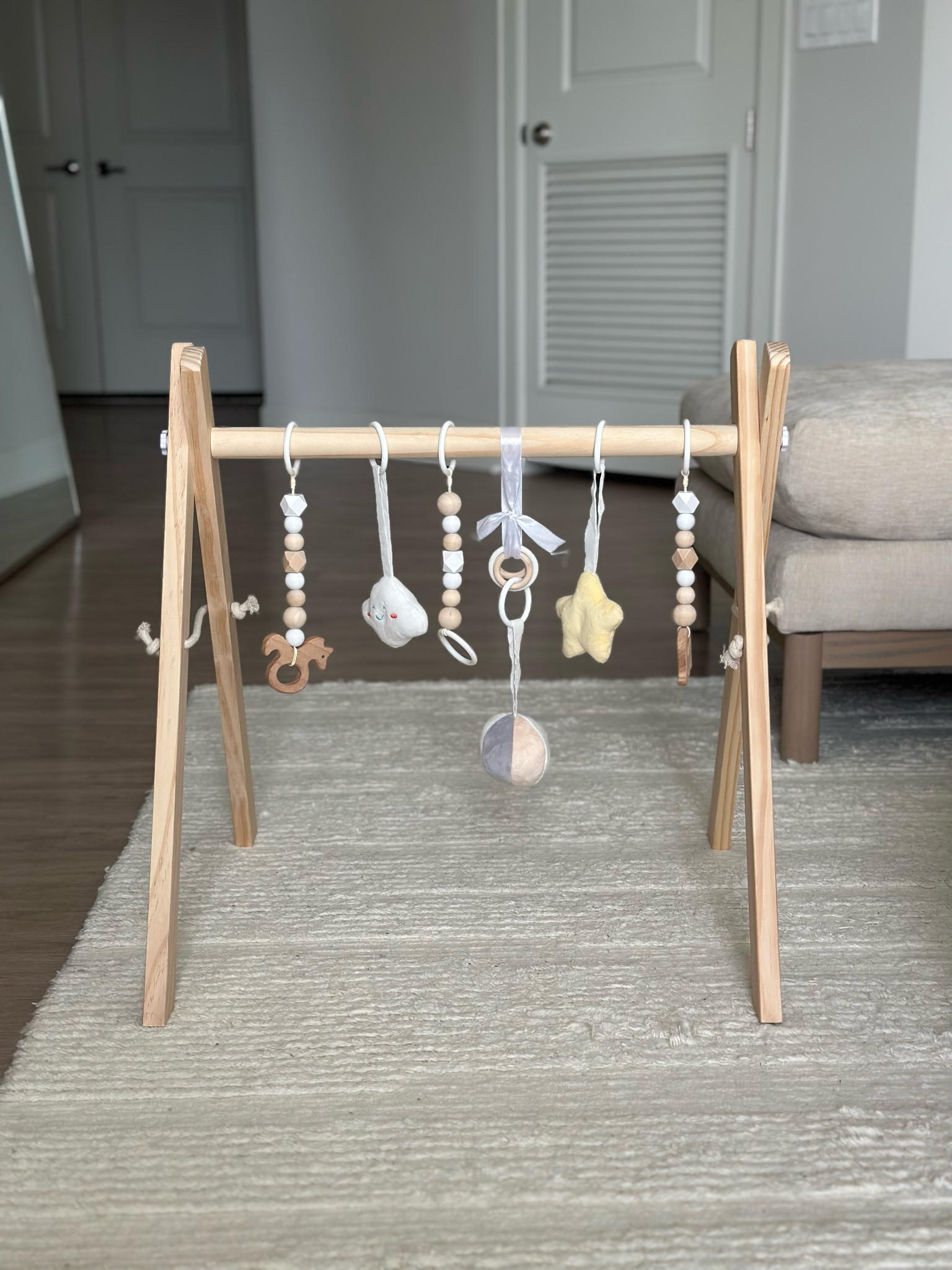 Natural wood baby play gym. Amazon find!

#LTKbaby #LTKfindsunder50 #LTKkids