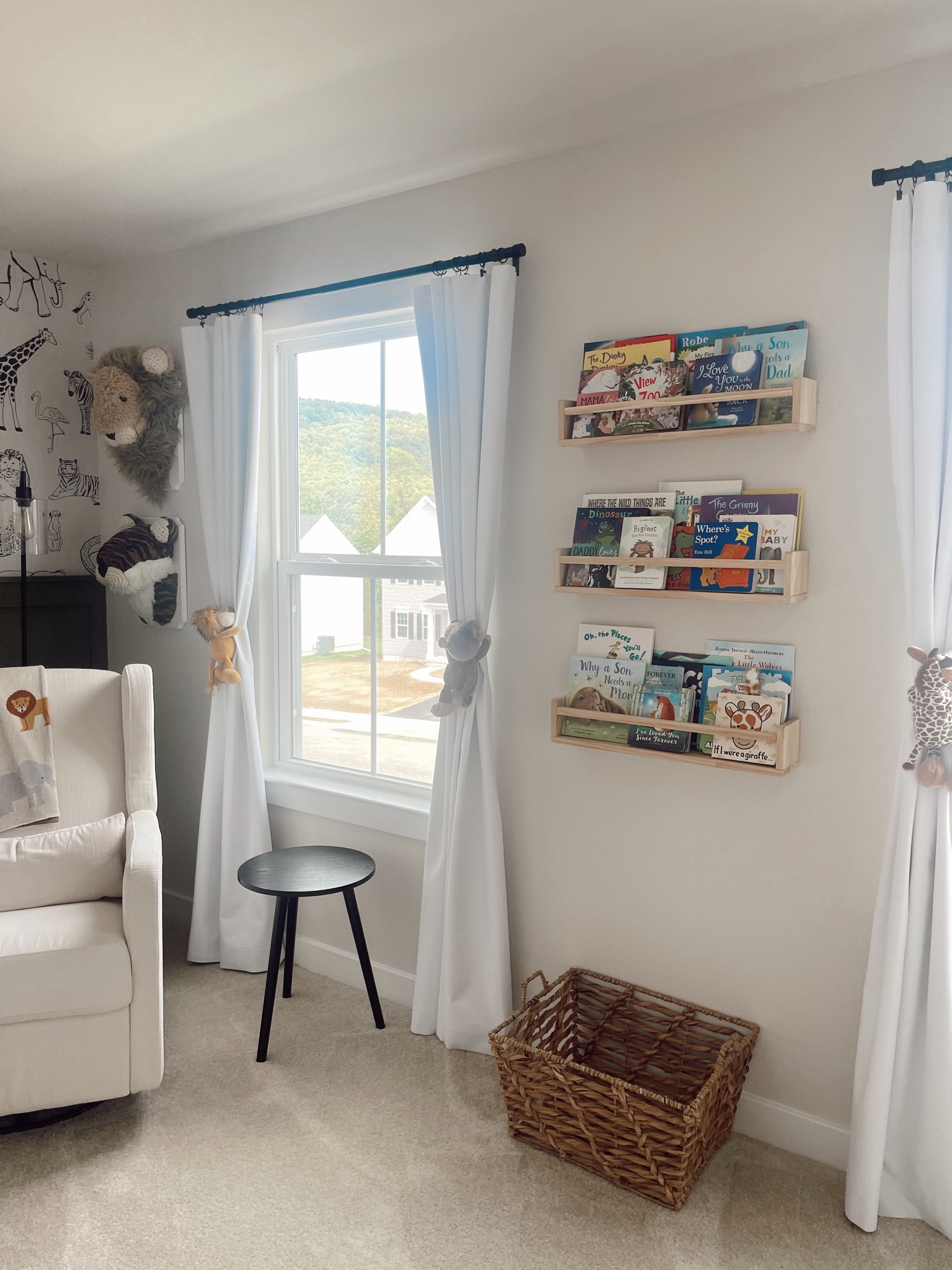 nursery decor | bookshelf | nursery wall art | glider | end table | curtains | jungle nursery | safari nursery

#LTKbaby #LTKhome #LTKbump