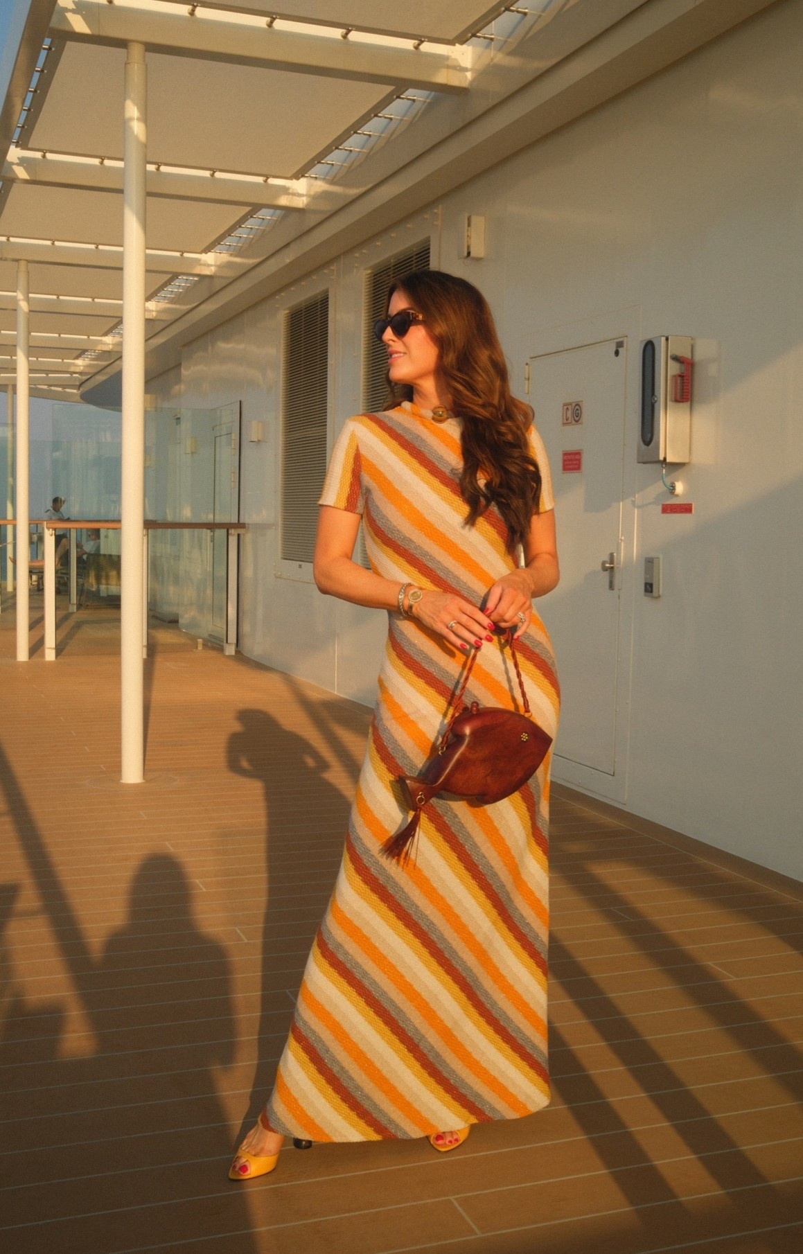One of my favorite looks from the trip. The built-in necklace makes this dress feel so elevated, and the warm stripes were perfect against the Mediterranean backdrop. I've linked my entire outfit—snag this dress while you still can. 

 #LTKootd #LTKOver40 #LTKTravel