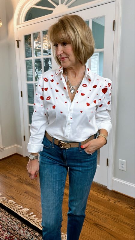 Valentine’s Day shirt! Super cute embellishment with hearts and kisses! Heart earrings add the perfect touch. 

#LTKSeasonal #LTKsalealert #LTKparties