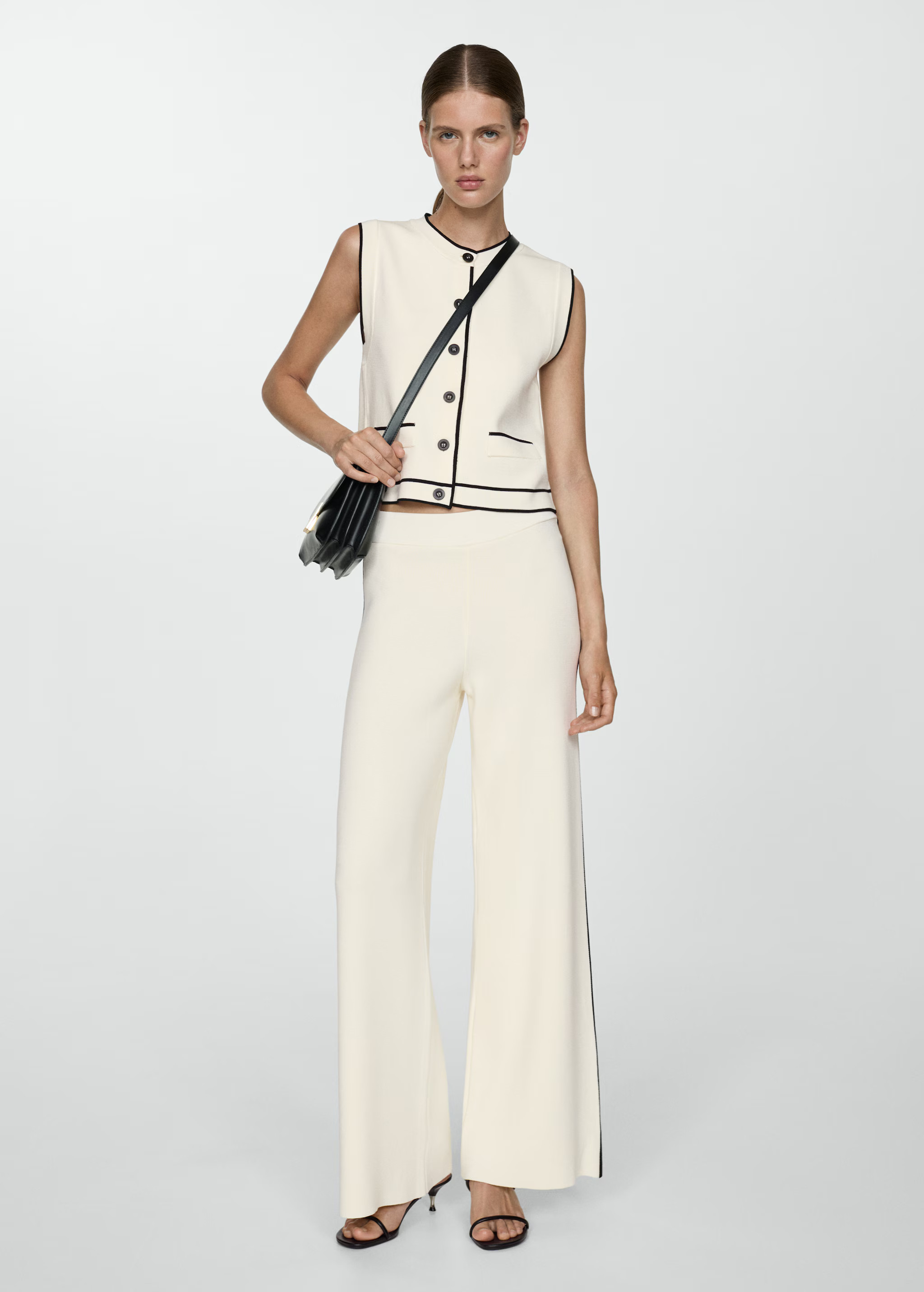 Knitted waistcoat with contrast piping - Woman | MANGO United Kingdom | MANGO (UK)