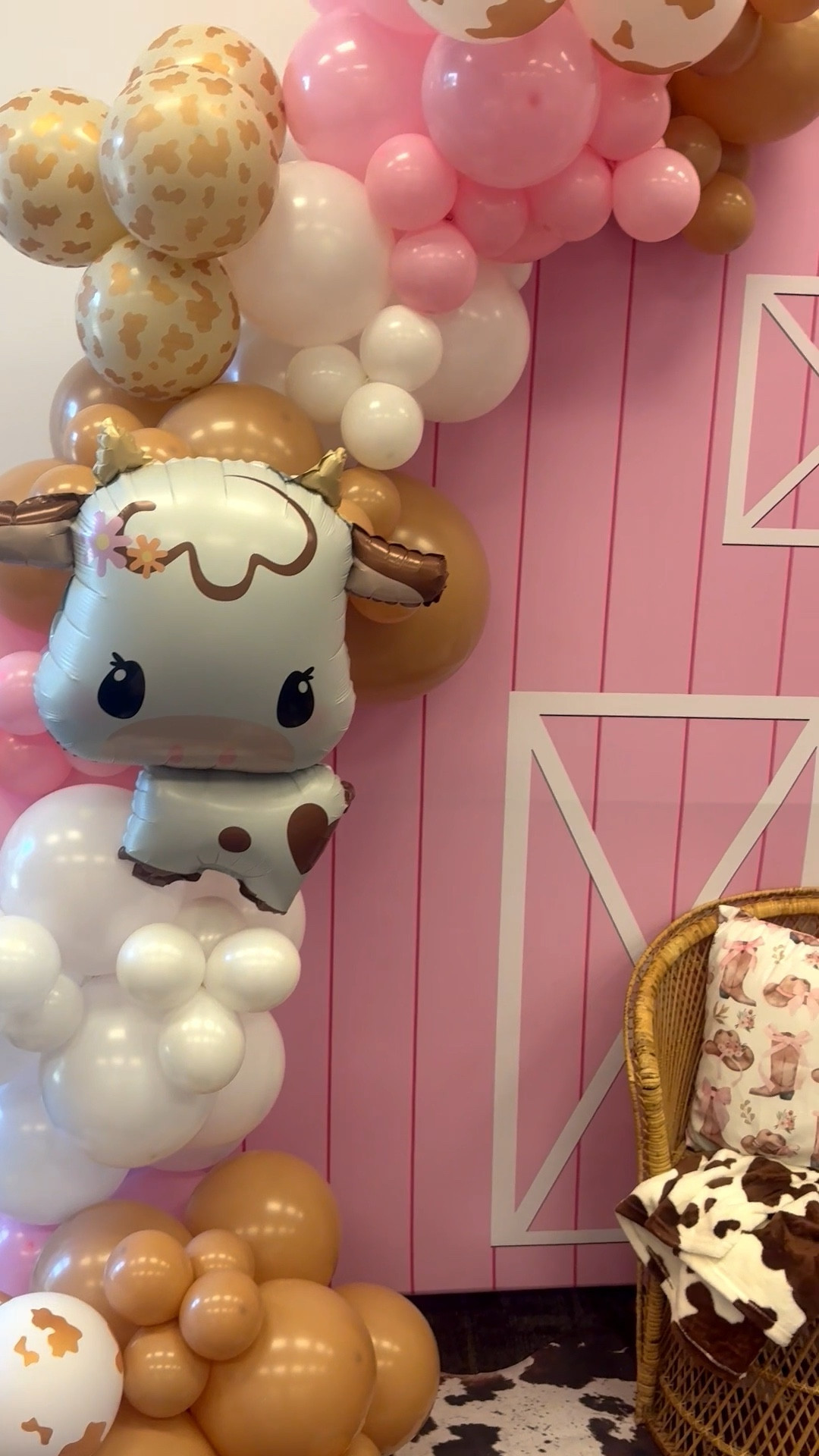 How adorable is this cowgirl birthday party backdrop?! 🎈✨ The mix of pink balloons, cow-print accents, and rustic barn details made it the perfect statement piece for a little girl’s 2nd birthday. 

#LTKParties #LTKFamily
