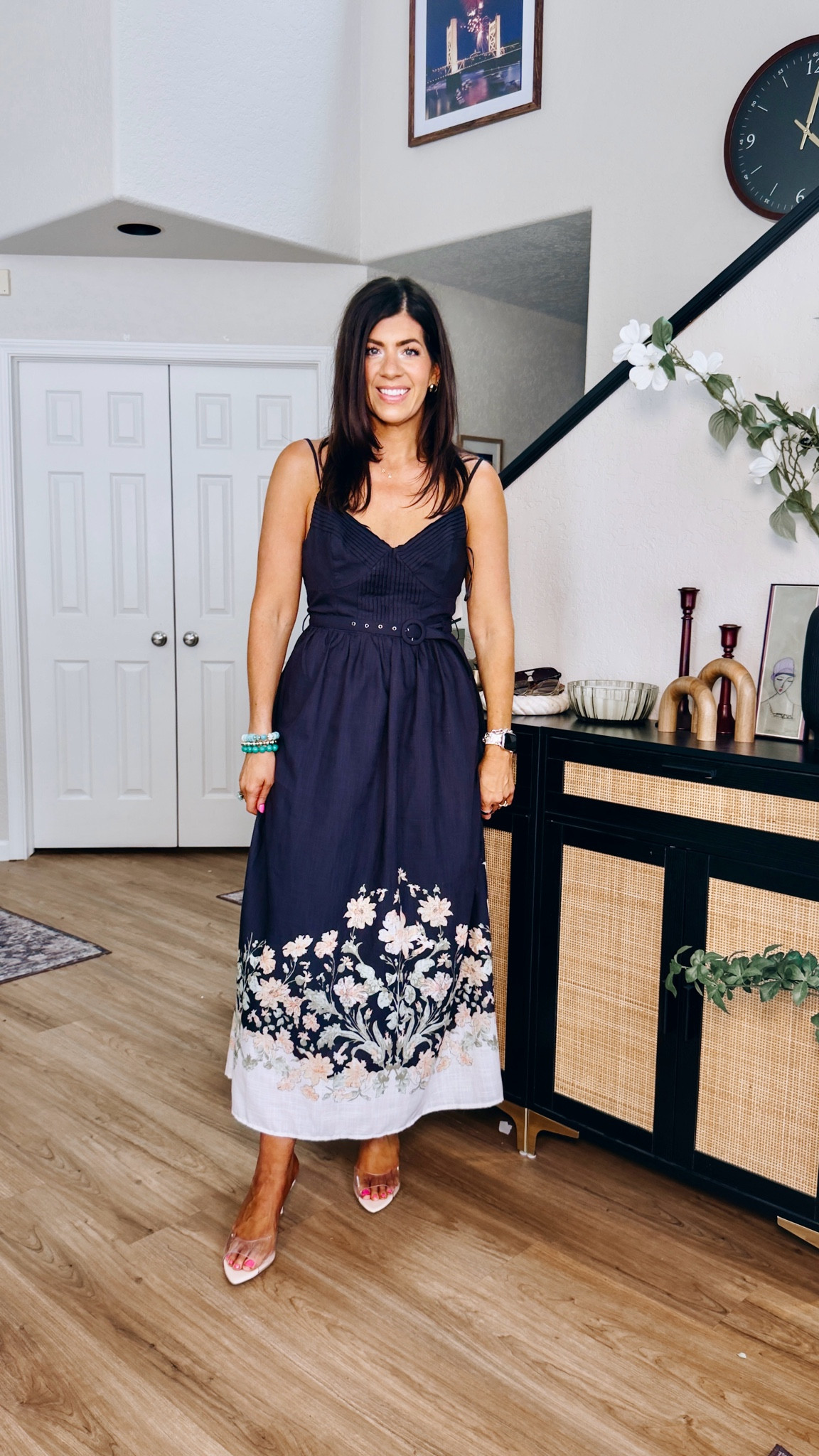In a medium floral dress

#LTKWedding #LTKWorkwear #LTKTall