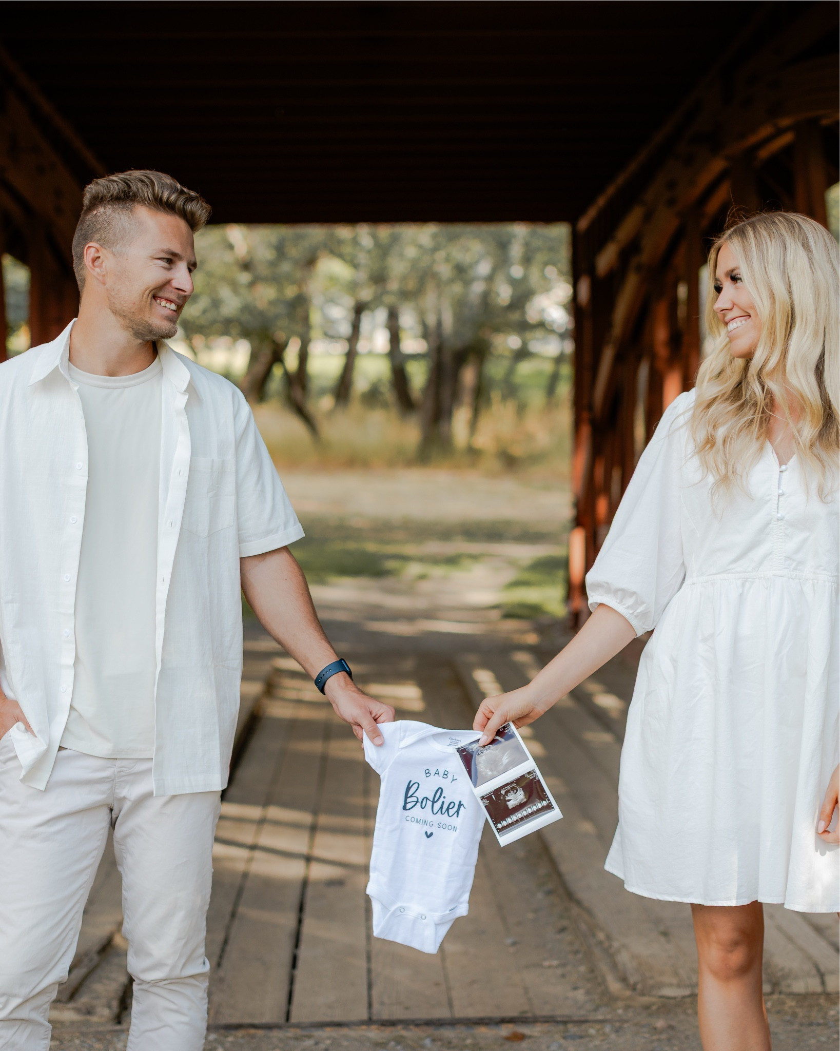 pregnancy announcement photoshoot outfits 🤍 loved this custom baby onesie!

 photo credit: @tianaflakephoto

| pregnancy announcement photos | bump friendly outfit | mens outfit | couples outfits | family photos 

#LTKFindsUnder100 #LTKBump