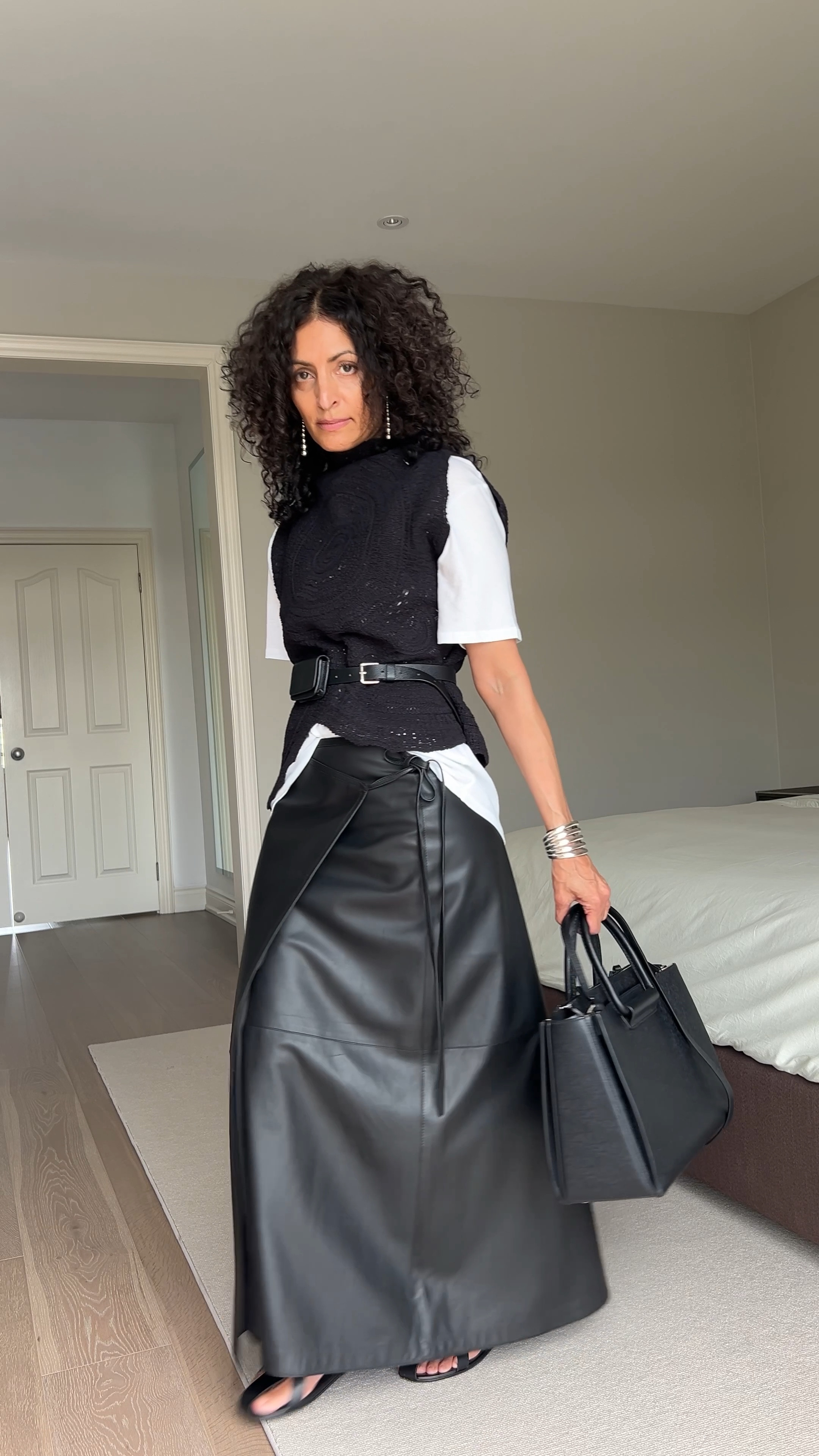 Took a small in the leather skirt to get the extra length, small in the tee, small in crochet top.  Bag and shoes are old The Row.  Belt old Club Monaco.  #therow
