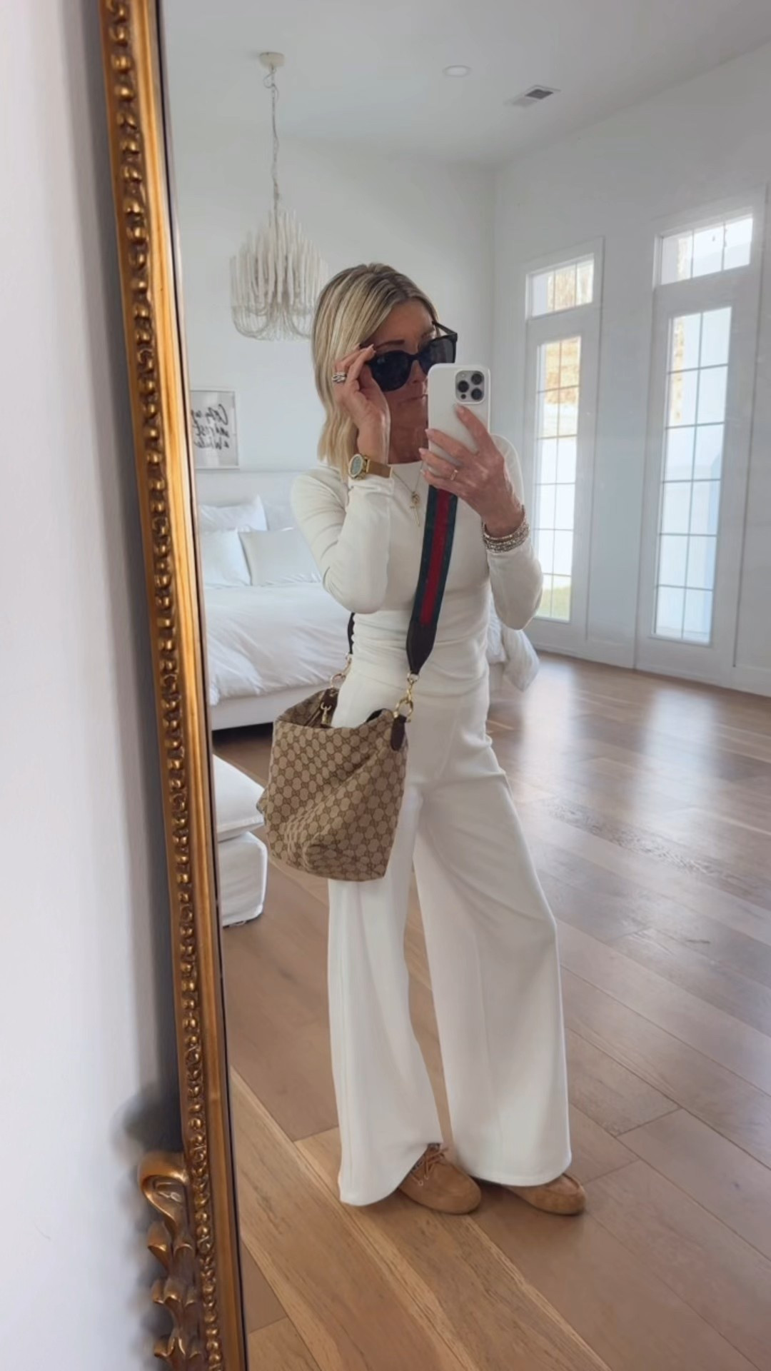 Out to lunch with friends , here’s the perfect outfit that screams  spring & summer !!! These ivory wide leg pants are amazing paired with this ivory super soft top , boat shoe slides & well the Gucci bag speakers for itself !!!!! I sized down in pants , top XS  , Gucci bag is the medium & so perfect!!!! 

#LTKootd #LTKBeauty #LTKOver40