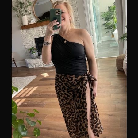 I am loving this black, one-piece, one shoulder, ruched swimsuit and leopard print sarong cover-up. These are definitely going with me on Spring Break!  And, I got it for 65% OFF!!!! 🙌🏻🏝️

#LTKU #LTKSale #LTKFind