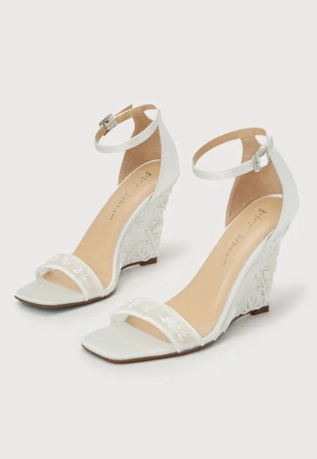 Shop party heels! The SB-Ivan Ivory Satin Embroidered Ankle Strap Wedges Sandals are under $150.

Keywords: White heels, bridal shower, party heels, white sandals

#LTKshoecrush #LTKwedding 

#LTKSeasonal