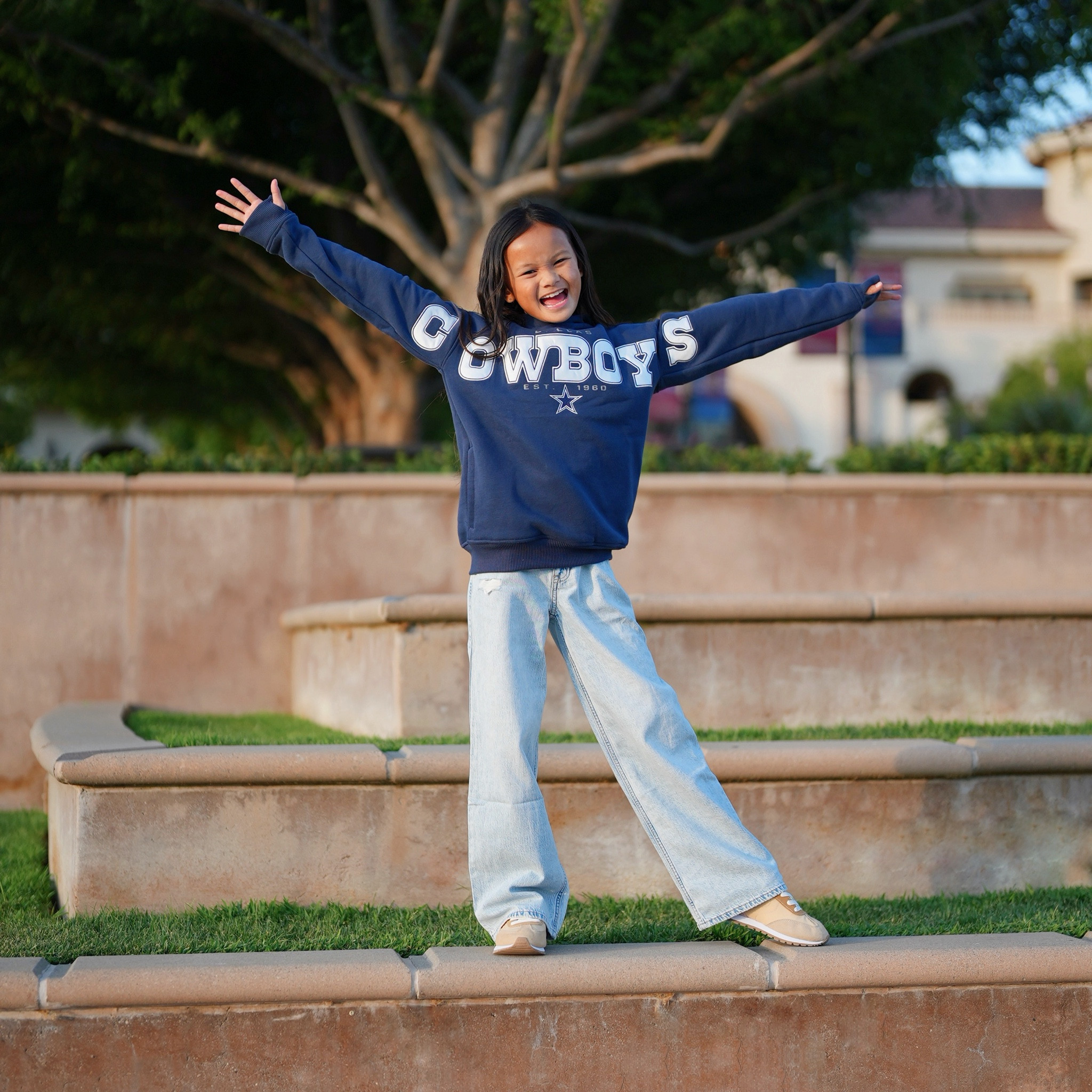 Game day ready with Abercrombie Kids. Girls NFL cowboys hoodie with wide leg jeans is perfect for this fall season. And we are loving the sleeves thumb holes to keep more warm. 

#LTKKids #LTKFallSale #LTKFamily