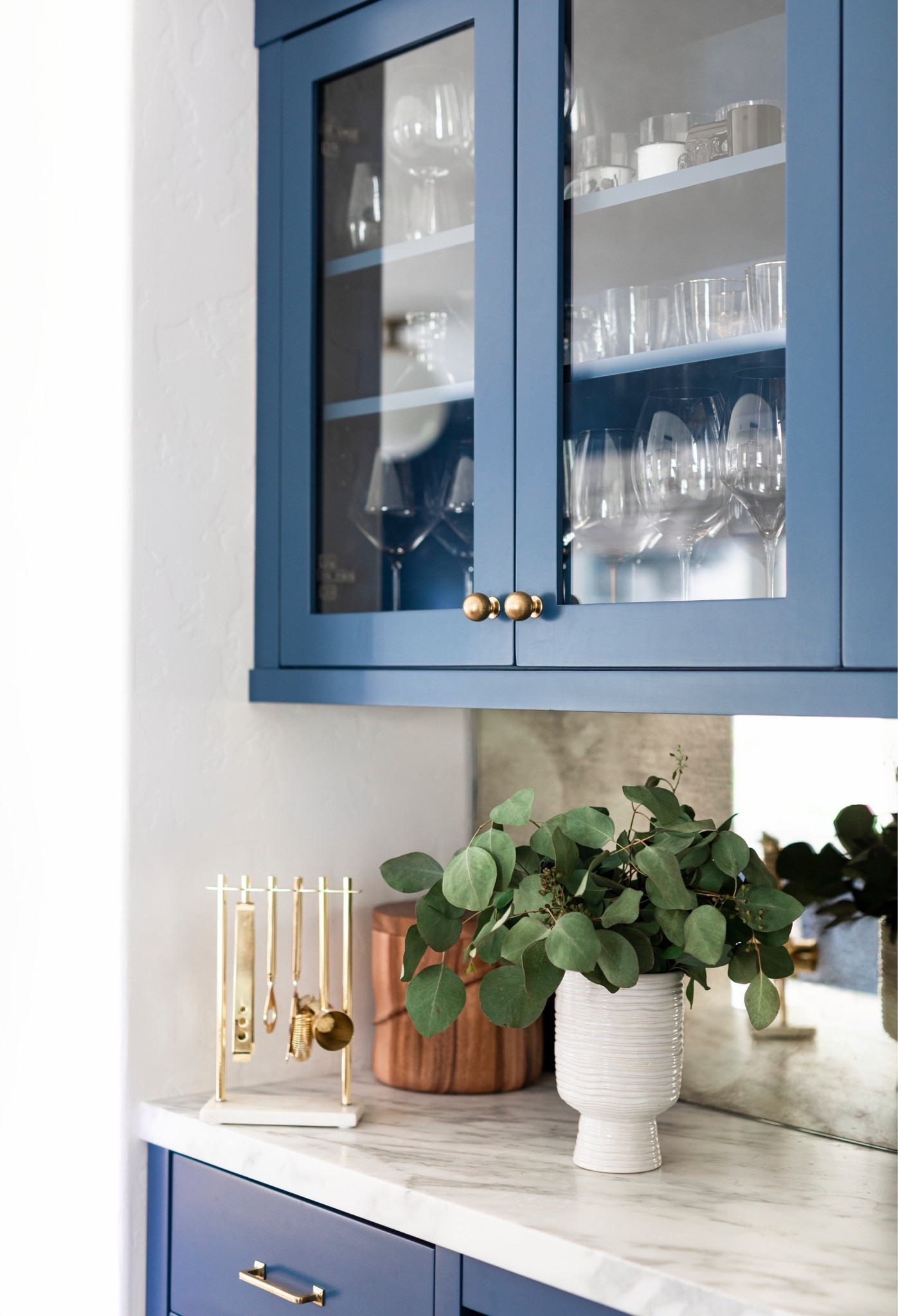 Moody home bar styling with warm wood tones, glassware, and elevated decor details for the perfect entertaining space. Home bar inspo, modern home bar, luxury interiors, cocktail corner styling, bar cart decor, and entertaining at home ideas

#LTKhome #LTKluxury #LTKsummer