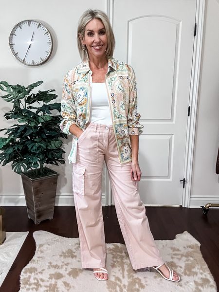 Cargo pants outfit for spring. Fit is all true to size. Love the pink and beautiful print top. 

Spring outfit, cargo pants, over 40, 

#LTKtravel #LTKover40 #LTKstyletip