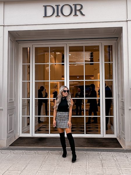 Fall outfit. Tweed skirt. Black body suit. High knee boots. Black high knee boots. Paris fall outfit. 

#LTKtravel #LTKshoecrush #LTKstyletip