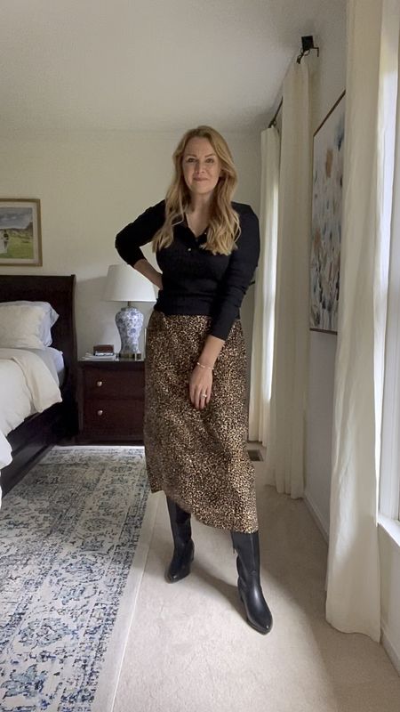 Thanksgiving or fall outfit idea — black ruffle henley tee with leopard skirt and tall knee high boots

I’m wearing my normal size in everything 

Exact skirt is sold out currently but I found similar options for y’all!

What to wear this thanksgiving 

#LTKSeasonal #LTKfindsunder50 #LTKHoliday