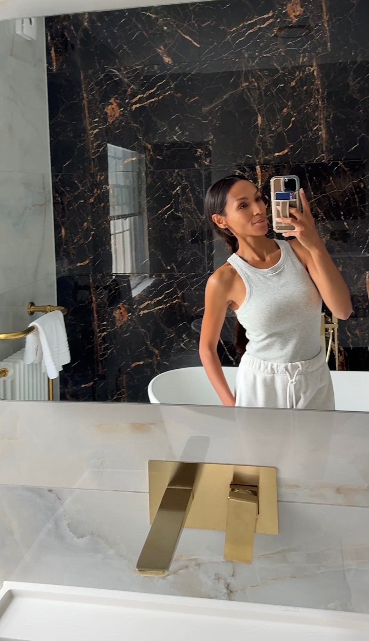 The perfect tank- quality is so good and has built in support! Love it with a good pair of denim! These sweatpants are my go to for traveling- the material and color is unreal 

#LTKTravel