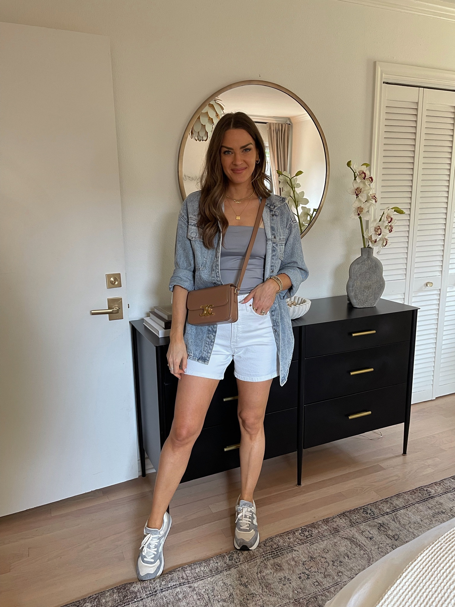 Cute but casual weekend outfit inspo! These shorts are so flattering & the tube top is so perfect for summer. I’m wearing a size S & a 25 in the shorts. My sneakers run TTS. // Abercrombie, Abercrombie outfit, denim shorts, tube top, summer outfit 