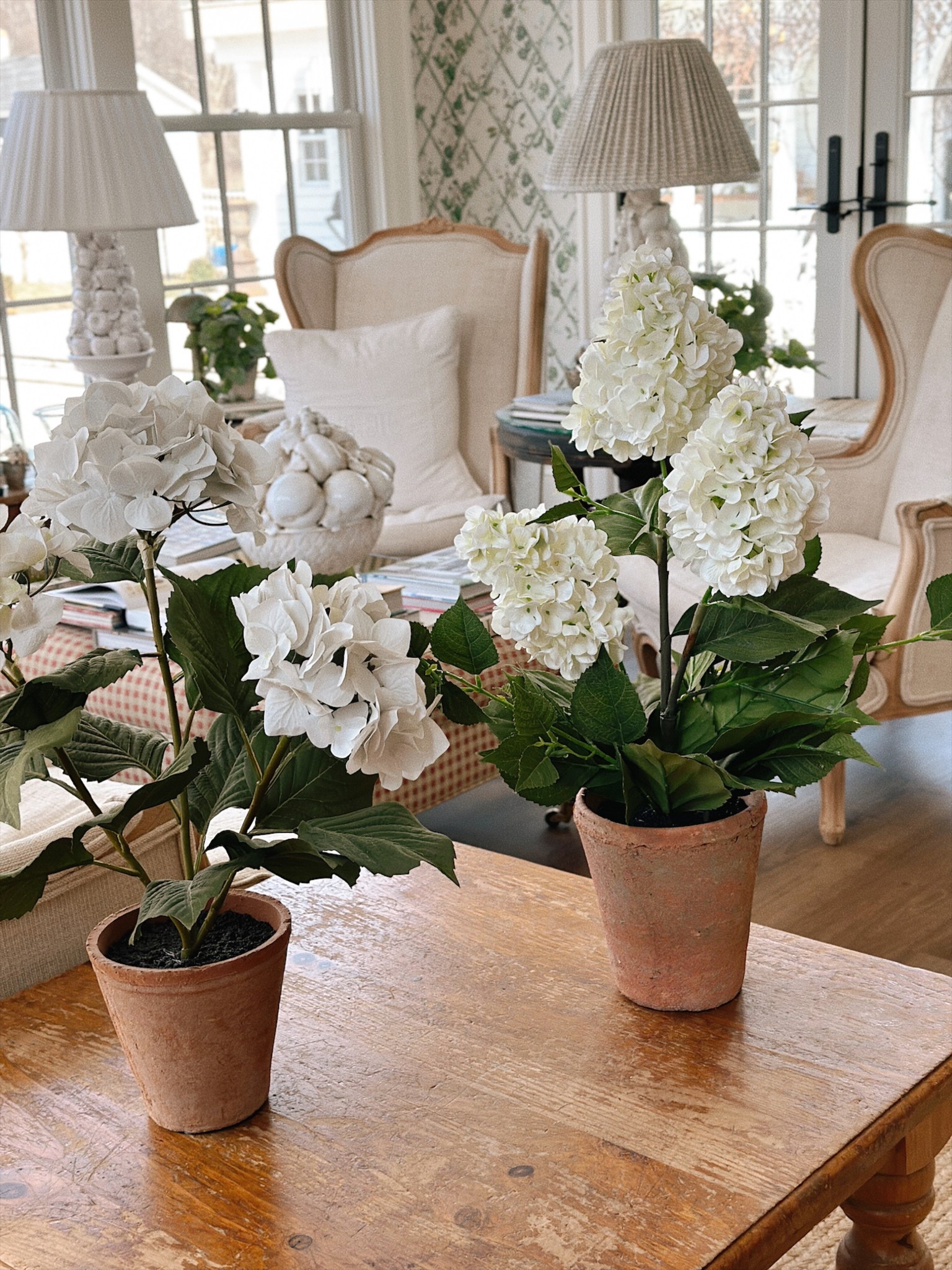 Cozy potted hydrangeas. On the right: clearance at pottery barn now & on the left, a recent tj maxx find! 

#LTKHome #LTKSaleAlert #LTKSeasonal