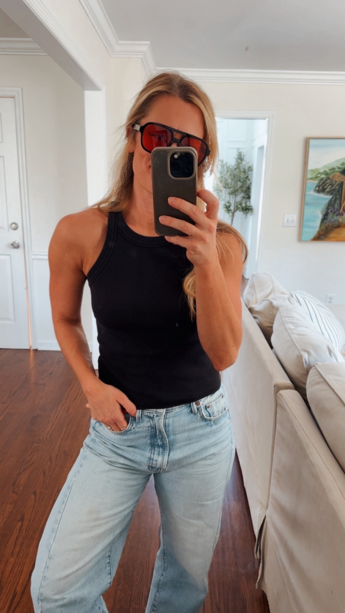 Simple black tank I’ve had for years and my new favorite sunnies 

#LTKootd #LTKmomlife