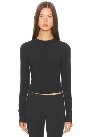 SKIMS Cotton Jersey Long Sleeve T-Shirt in Black | FWRD 