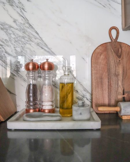 Amazon olive oil dispenser 

kitchen countertop styling, salt and pepper mills, marble tray, cutting board, salt cellar

#LTKhome #LTKstyletip #LTKunder50