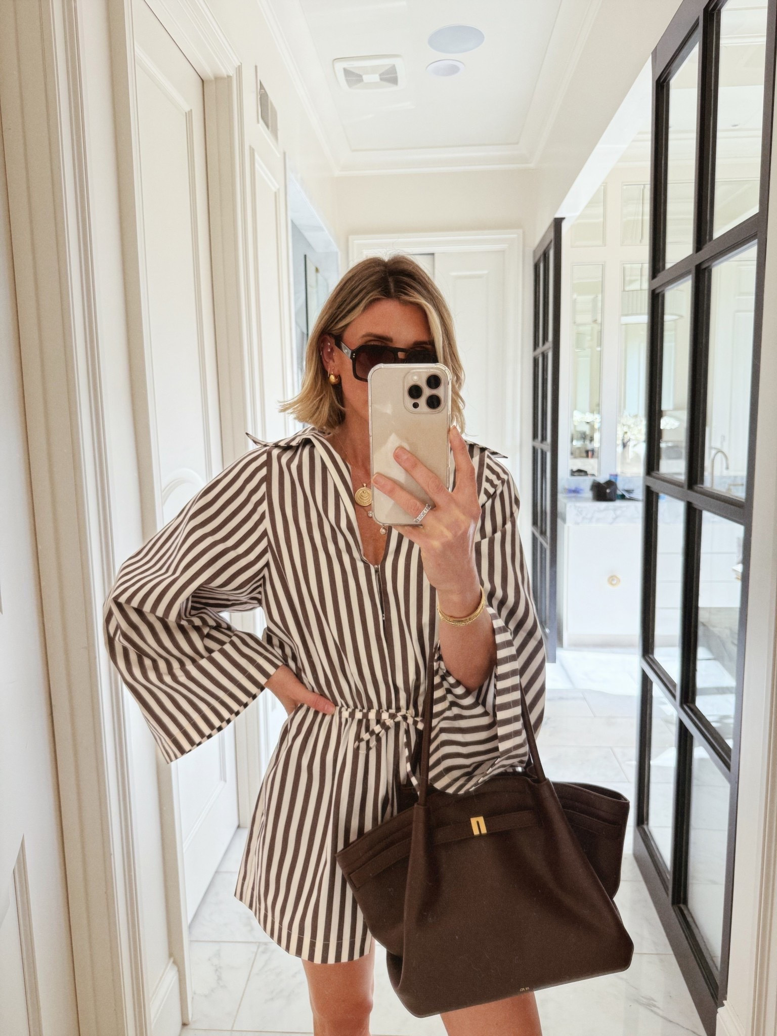 Love this striped romper. My brown stripe version is out of stock but I love this in pink!

#LTKootd