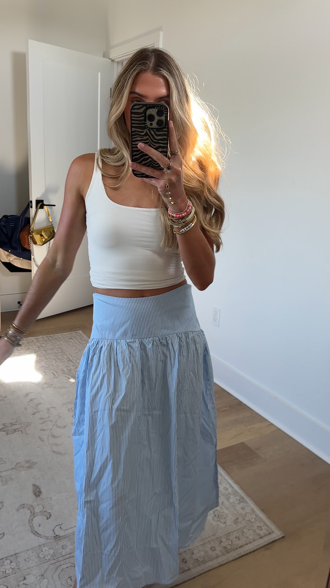 Amazon size small Mannjin Women's Stripe Flared Maxi Skirt with Smocked High Back Waist Long Skirts Summer Beach Vacation Outfits

#LTKootd #LTKSeasonal #LTKSaleAlert