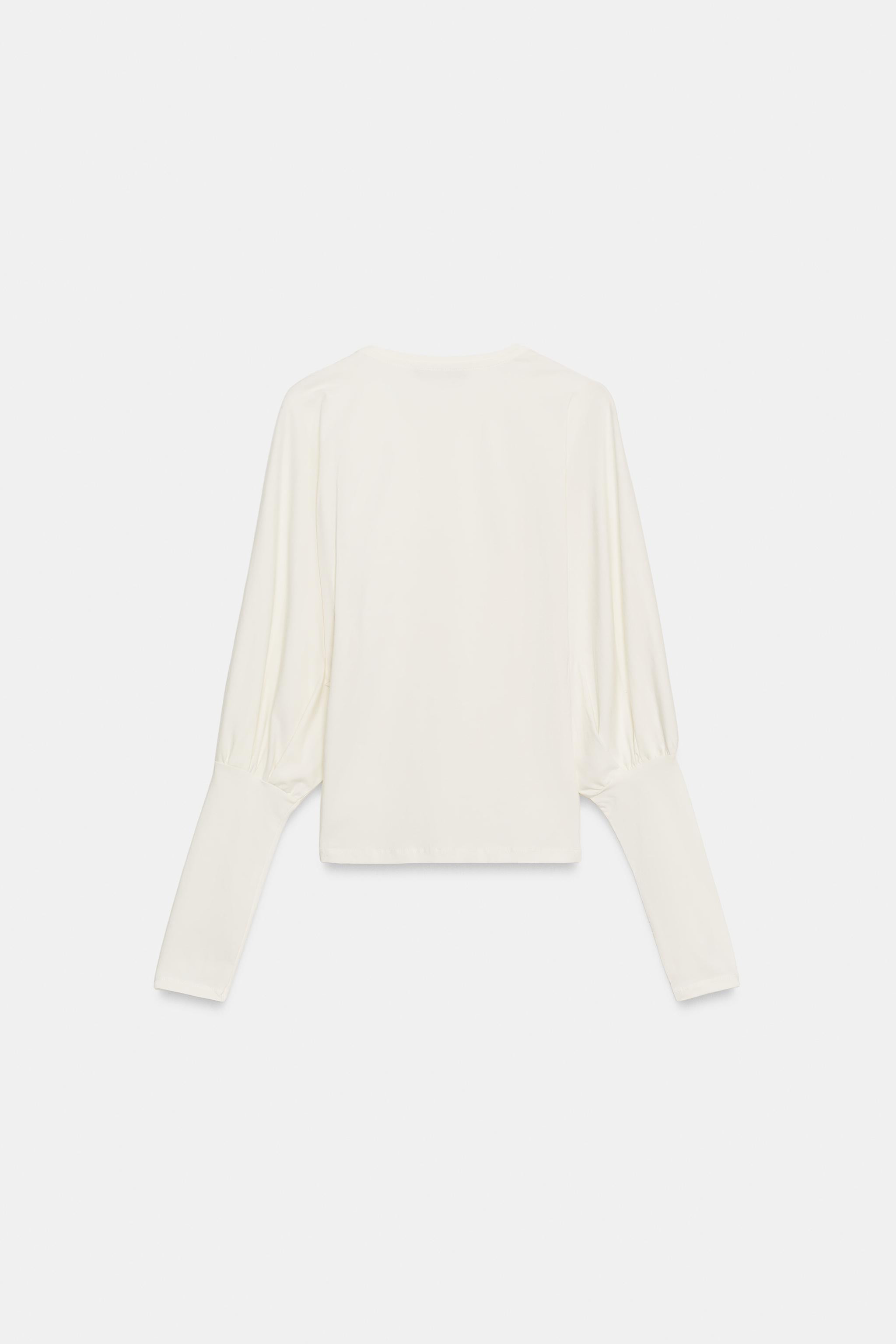 SLIM FIT - ROUND NECK - REGULAR LENGTH - PUFF SLEEVE T-shirt made from a cotton blend. Featuring ... | Zara UK
