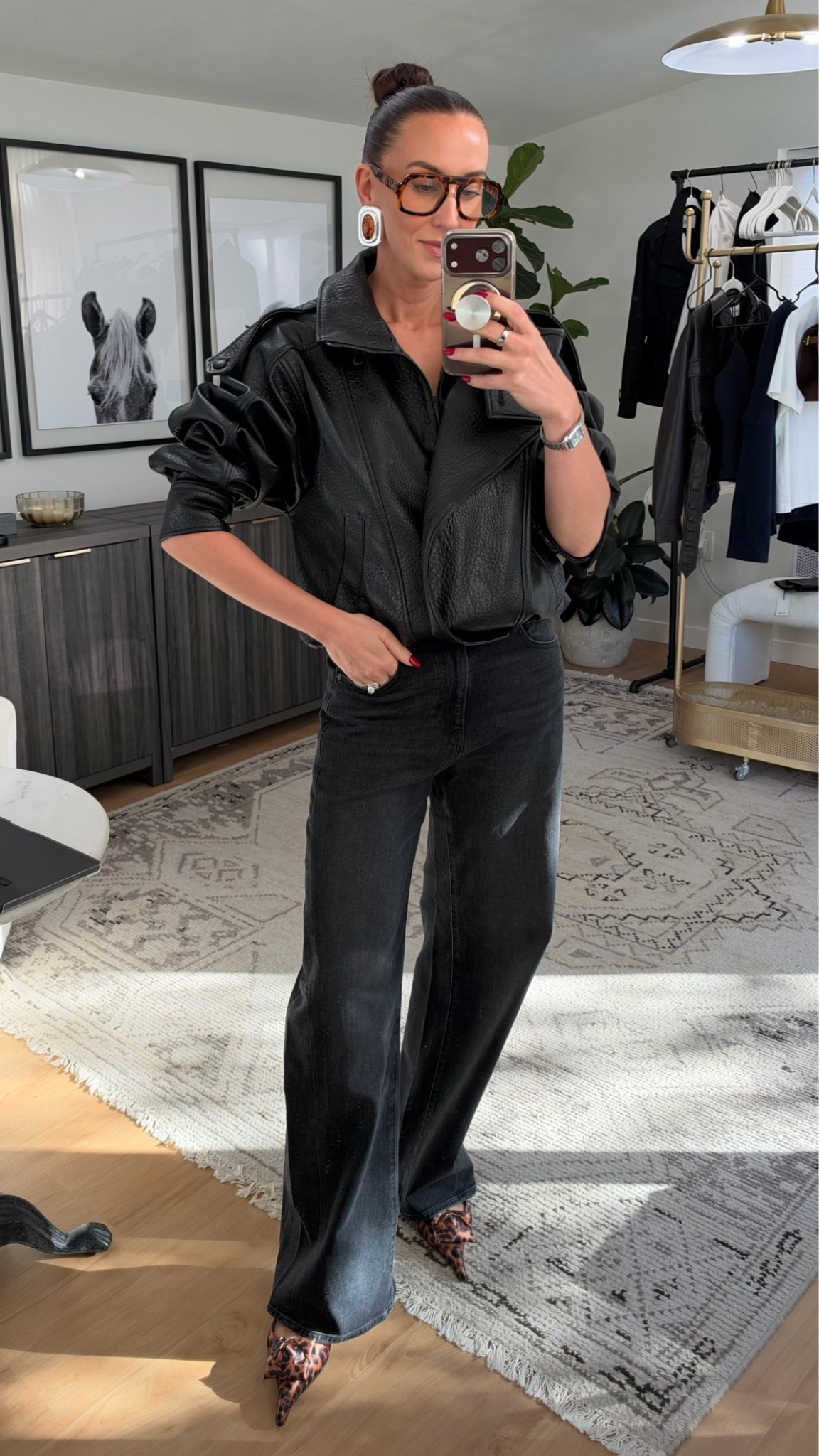 All black, with one statement 🖤🐆 

An oversized leather jacket, black wide-leg jeans, amber statement earrings, tortoise frames, and leopard pointed heels with a bow. Edgy, easy, and still a little bold. 

Shop the look below!
#LTKstyletip #LTKSeasonal #LTKshoecrush #LTKitbag #LTKfindsunder100