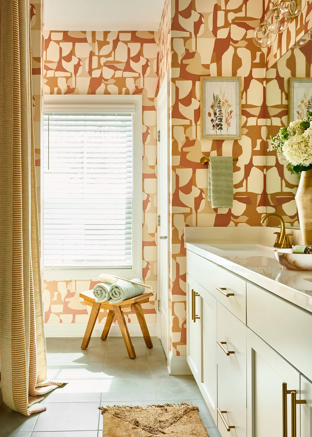 #WallpaperWednesday ✨ Wallpaper has the power to completely transform a room, and this bathroom is proof. The warm terracotta pattern brings personality, movement, and a collected feel—turning an everyday space into one that's both timeless and unforgettable.

Because every room deserves a little moment. 🤎

#WallpaperWednesday #BathroomDesign #StatementWallpaper #SoulfulMaximalism #HomeDecor 

 #LTKHome