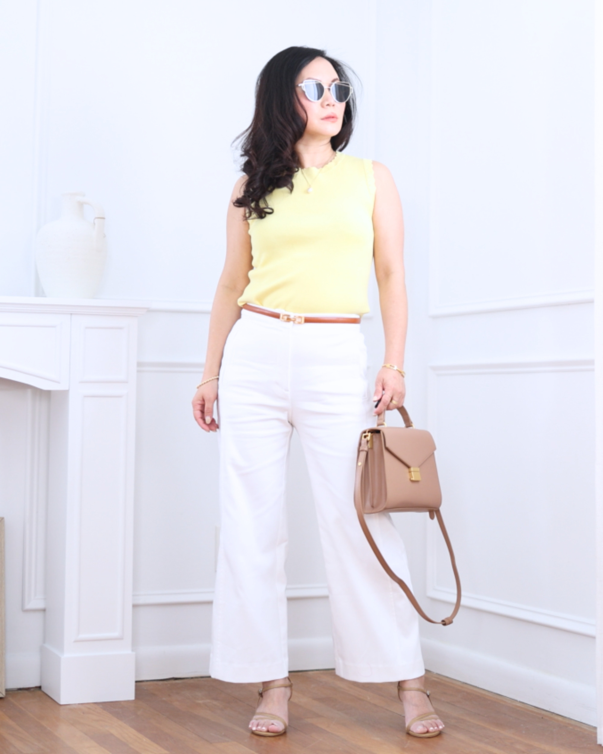 Sweater shell top paired with petite white pants, both from Ann Taylor — simple, clean, and effortlessly polished for a fresh everyday look. I’m 5’2, wearing size XS.

#LTKPetite #LTKOver40 #LTKootd