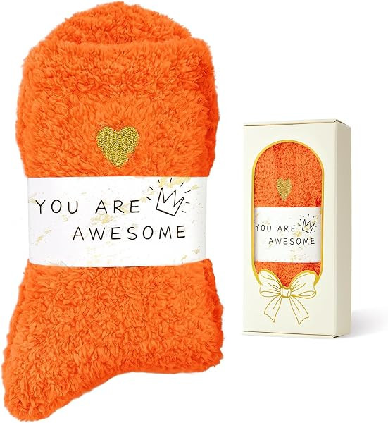 Cloud-soft coral fleece wraps feet in gentle warmth for sleeping, lounging, spa days, and comfort... | Amazon (US)