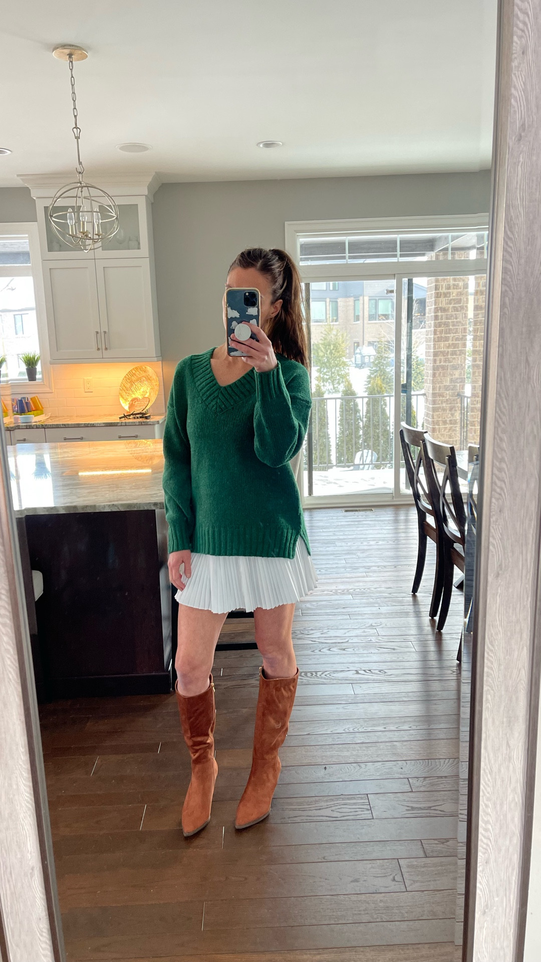 Green oversized v-neck sweater paired with an athletic white pleated mini skirt and tall brown suede kitten heel boots



Every day style, Affordable, versatile , comfy, easy outfit , sale alert, winter style, spring and fall looks, outfit ideas


#LTKmomlife #LTKdayinmylife #LTKSpringSale