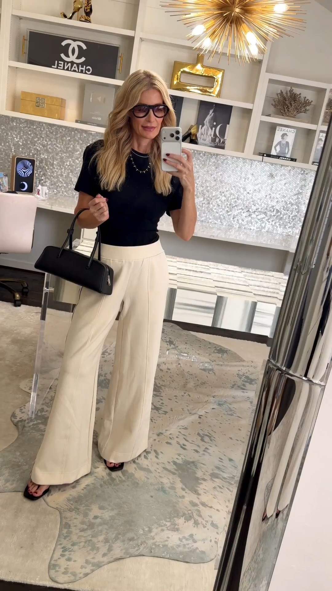 The easiest elevated outfit starts with polished wardrobe basics! This fitted black tee and ivory wide-leg pants create a chic, flattering look that works beautifully for the office, dinner, or any fall occasion. I’m wearing an XS in the tee and an XS in the pants. #WideLegPants #ElevatedBasics #FallOutfit #FashionOver40 

 