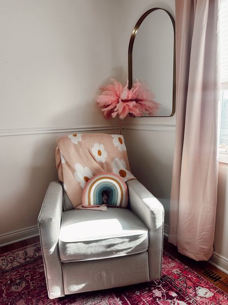 My favorite corner in my baby girls room / nursery, area rug, pink rug, feather lamp, floor lamp, amazon finds, glider, rocking chair, pink curtains, black out curtains, gold mirror, baby girls room, girl nursery, rainbow pillow, throw blanket, baby blanket, throw pillow, flower blanket #nursery #babygurl 

#LTKbaby #LTKsalealert #LTKhome