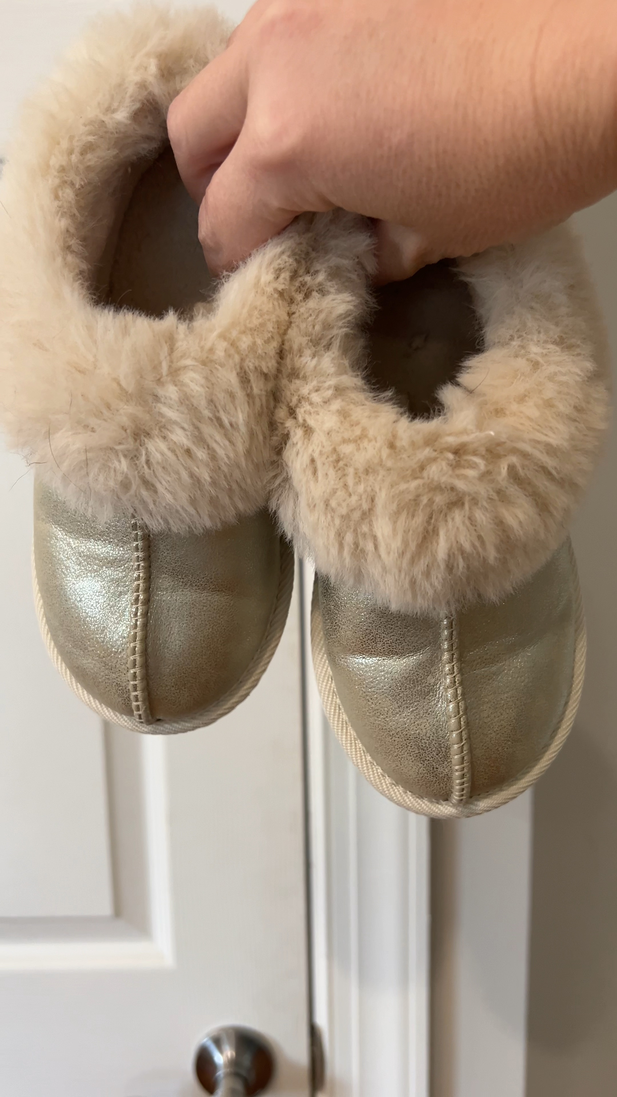 The cutest fur lined slippers for toddlers and little girls! We just sized up for both girls- it's so nice to wear in the house when it's really cold especially since we have hardwood floors. Comes in size 5t-4 and 3 different colors- gold, pink, and black! 

#LTKKids #LTKSaleAlert #LTKShoeCrush