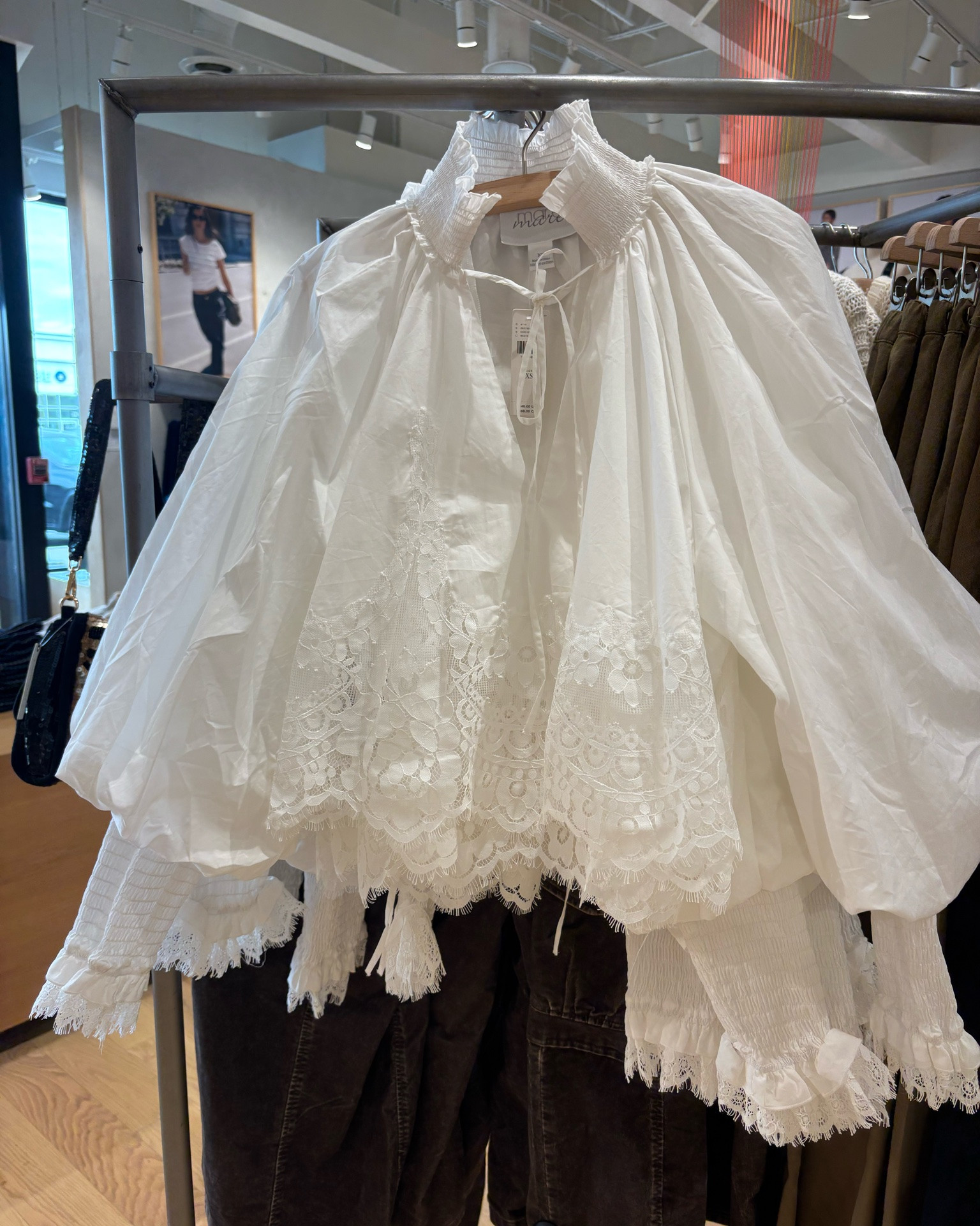 dramatic balloon sleeves with smocked elongated cuffs and a tie-front V-neckline

#LTKootd #LTKSeasonal #LTKOver40