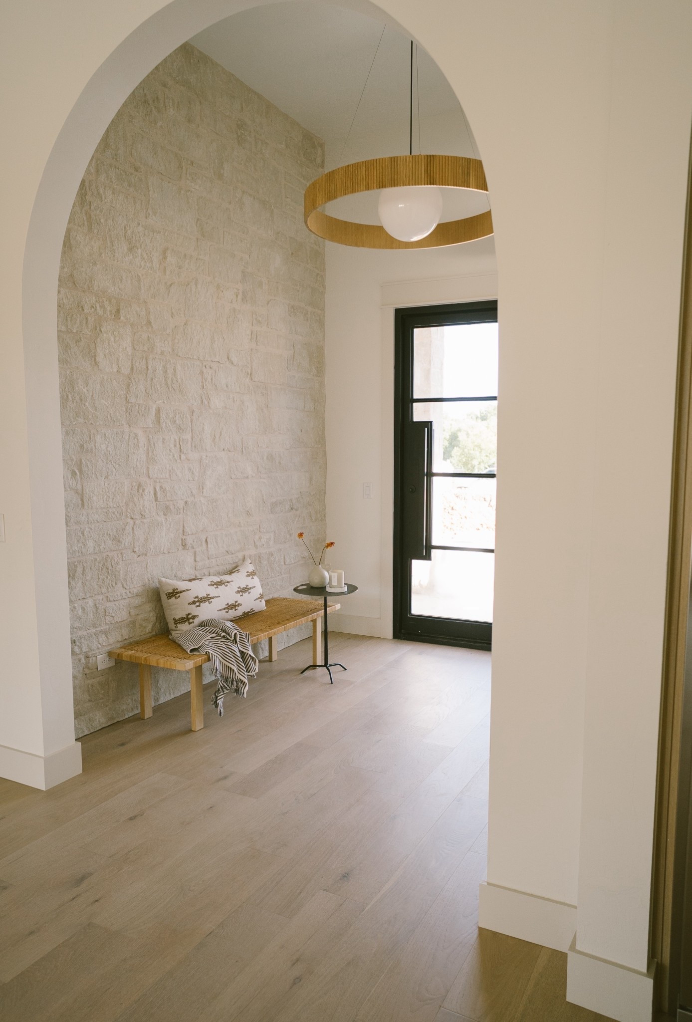 Styling this serene entryway with just a few intentional pieces. I love how the light oak bench, striped throw, and minimal black side table keep the space feeling calm and airy. Tap to shop all the furniture and accents I used in this look!

#LTKHome