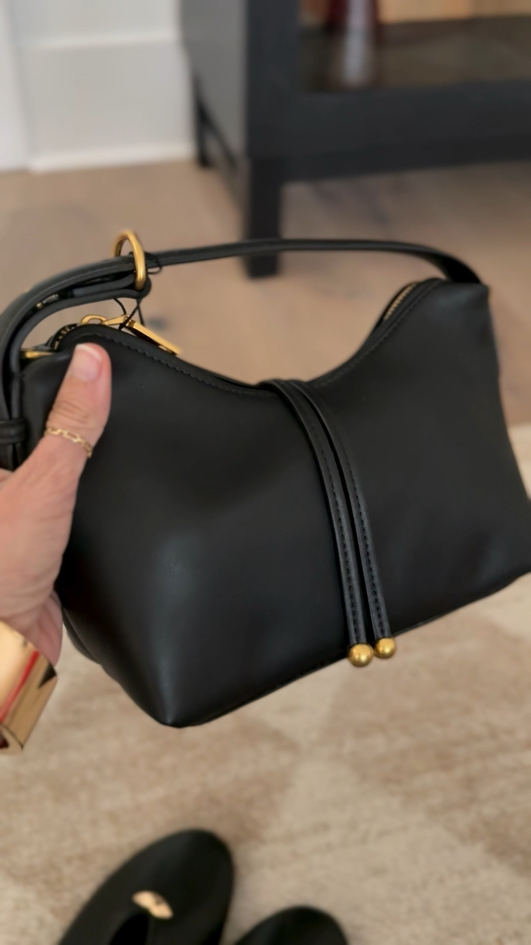 minimalist bag with gold hardware 