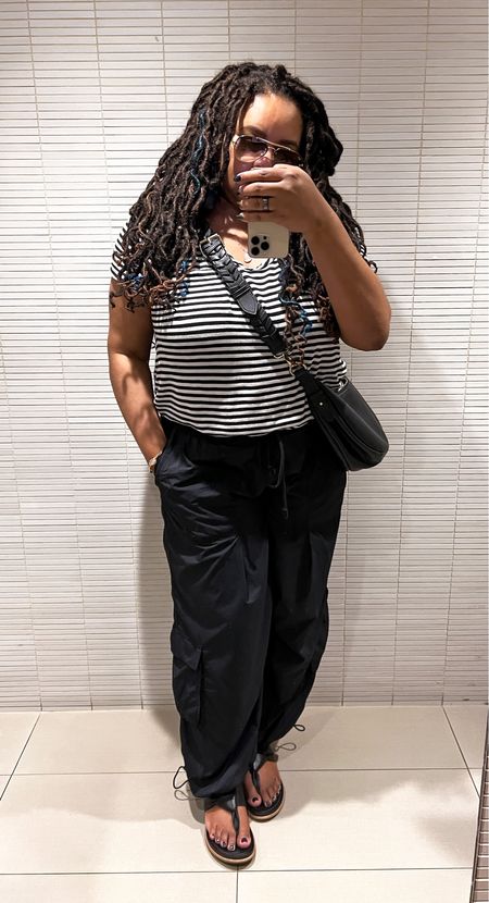 OOTD. It's late summer and we're at the top of a heatwave in NYC 🥴
I chose Anthropologie parachute pants b/c they're super comfy and lightweight. Perfect for a strenuous PT session. 😬 #ltkunder100 #ltkunder50 

#LTKmidsize #LTKover40 #LTKstyletip