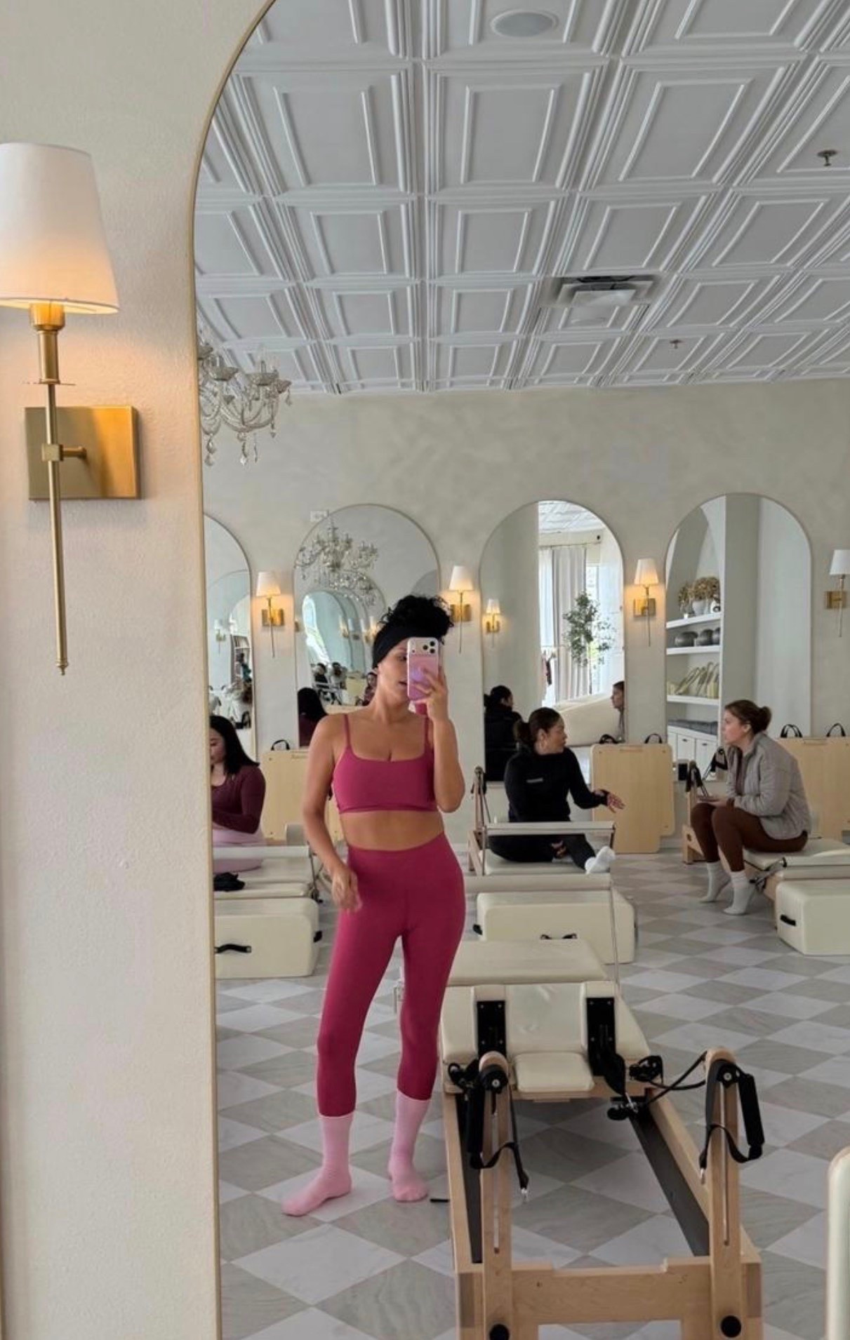 Pilates, but make it pink 💕 A matching activewear set with coordinating grip socks is the kind of workout look that makes getting to class a little more fun.

#PilatesOutfit #PinkActivewear #MatchingSet