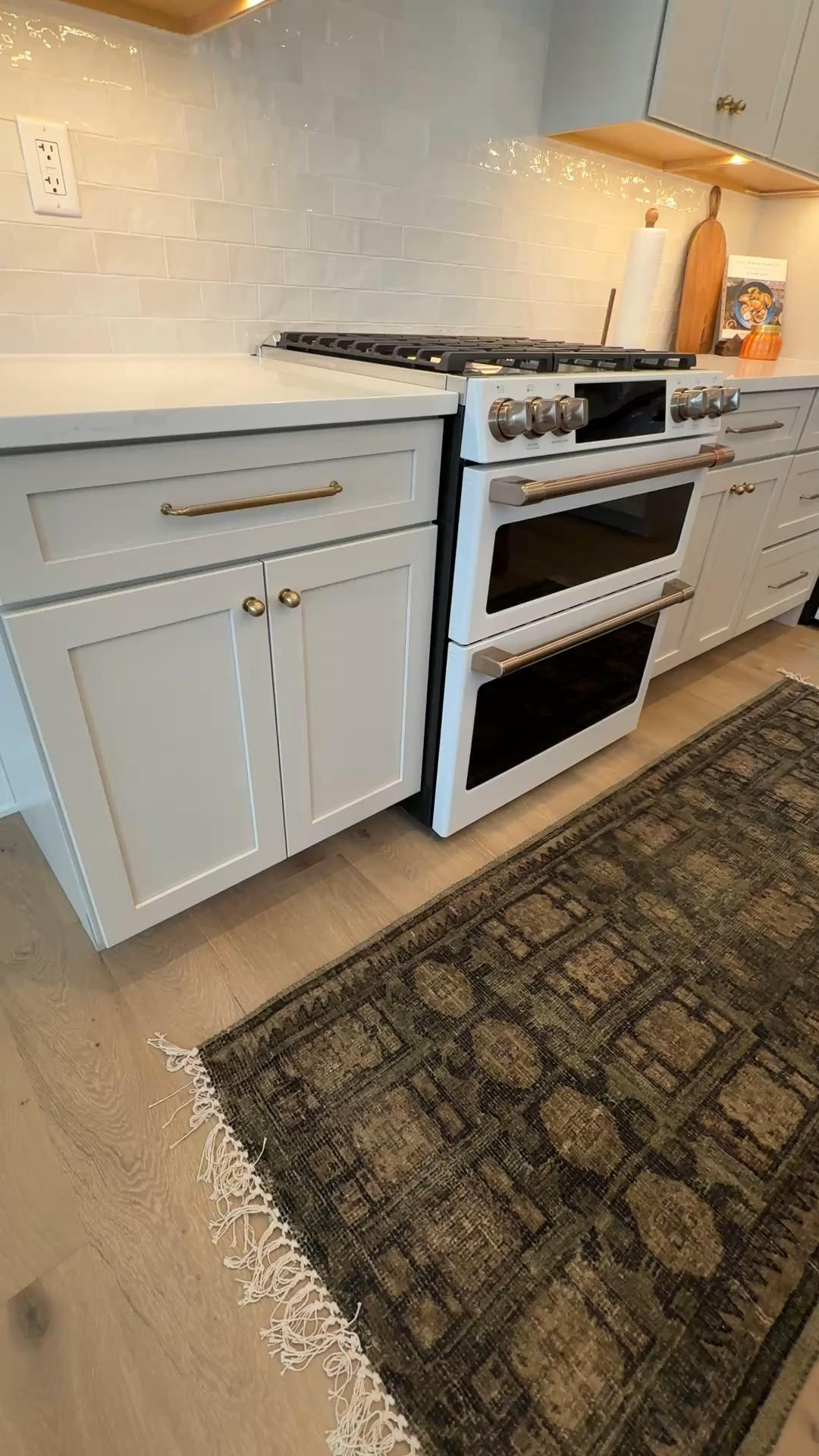 As an interior designer, our team doesn't have just one favorite, but there are pieces that we always know are going to make a statement. 

This West Elm reversible rug was that show stopping moment in what was an otherwise very neutral kitchen. Layering in the pattern and texture of the rug, mixing natural elements in their bar stools, and gorgeous metal fixtures, and you've got a kitchen full of charm and character.  

 #LTKHome