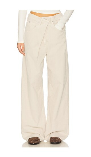 AGOLDE Vana Fold Wide Leg Jeans in Cream. - size 26 | Revolve Clothing (Global)