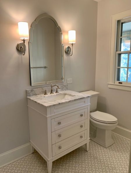 Shop our newly renovated guest bathroom, including vanity, lighting, and mirror! If you want to learn more about paint colors or tile, check out Instagram! @followthefind

#LTKsalealert #LTKhome #LTKfindsunder100